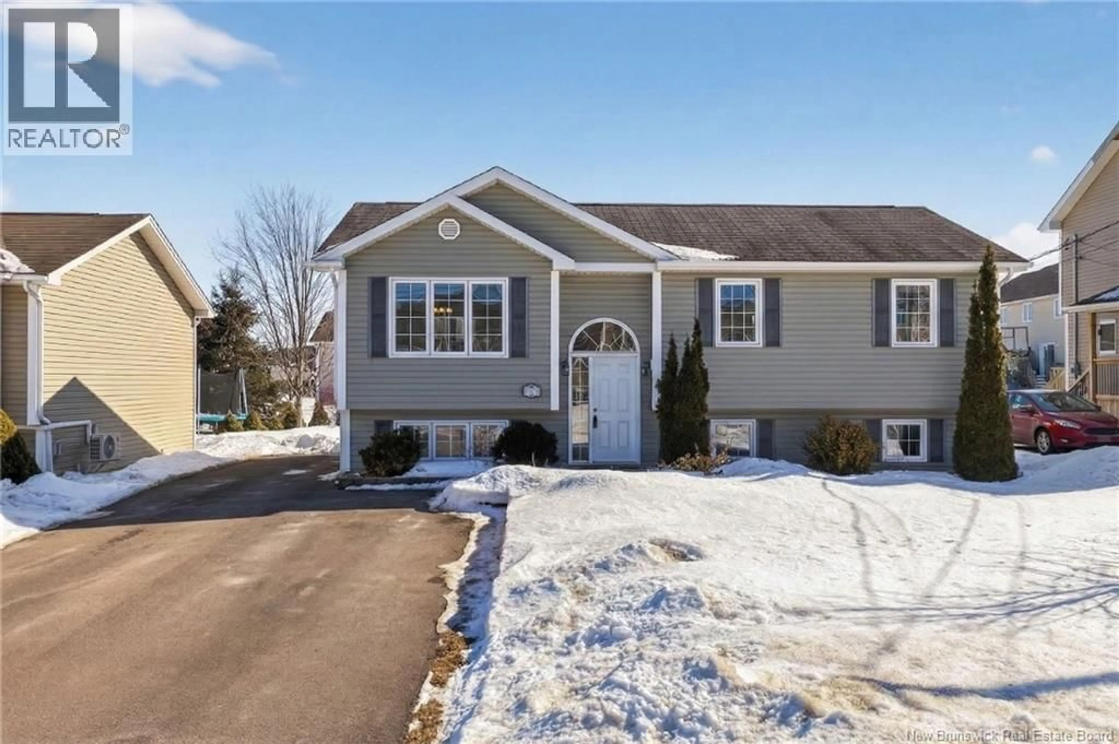 Home with vinyl exterior material, street for 94 FALCON, Moncton New Brunswick E1G0H7