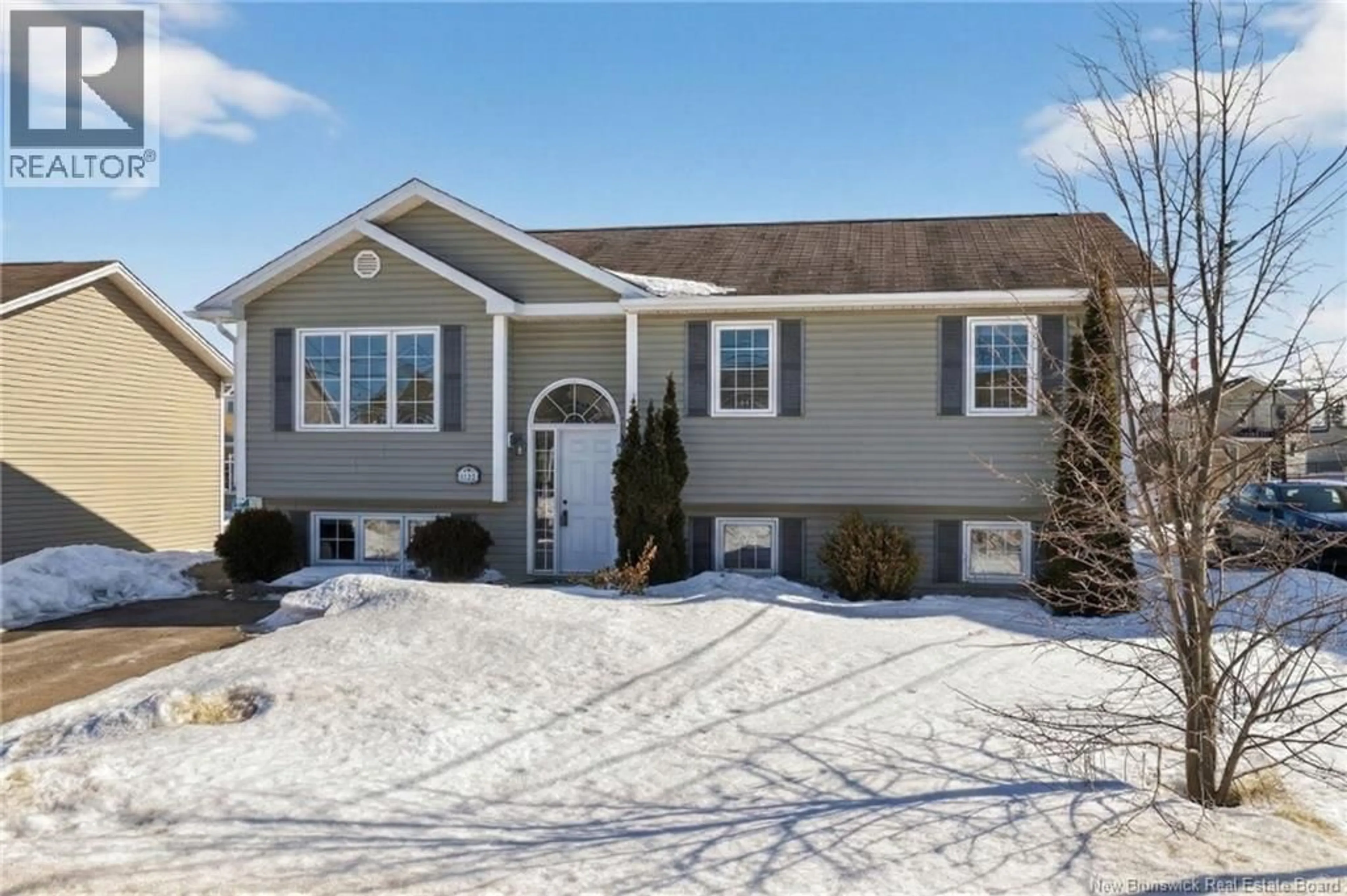 Home with vinyl exterior material, street for 94 FALCON, Moncton New Brunswick E1G0H7