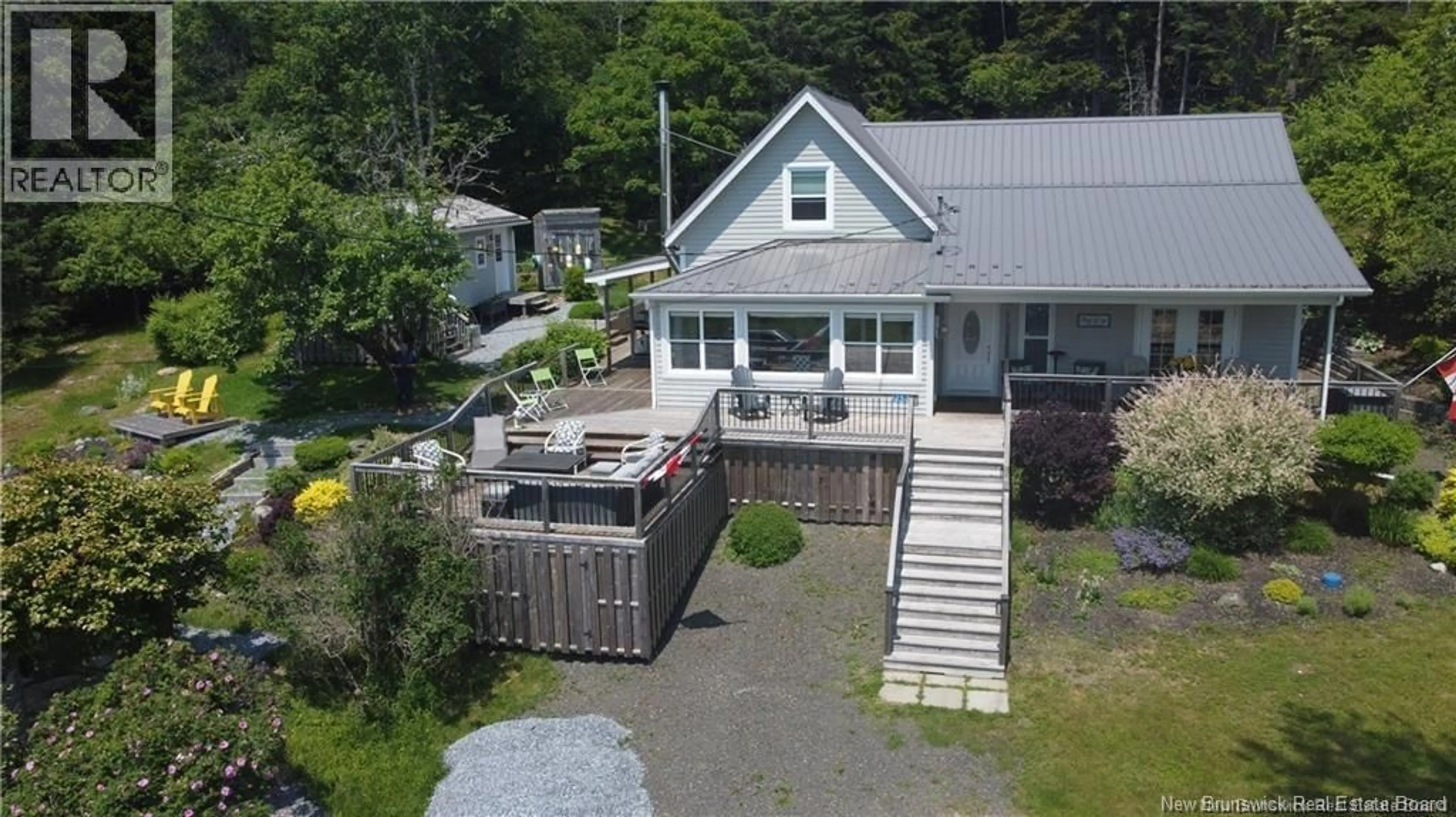 A pic from outside/outdoor area/front of a property/back of a property/a pic from drone, water/lake/river/ocean view for 1253 RTE 772, Cummings Cove New Brunswick E5V1G3