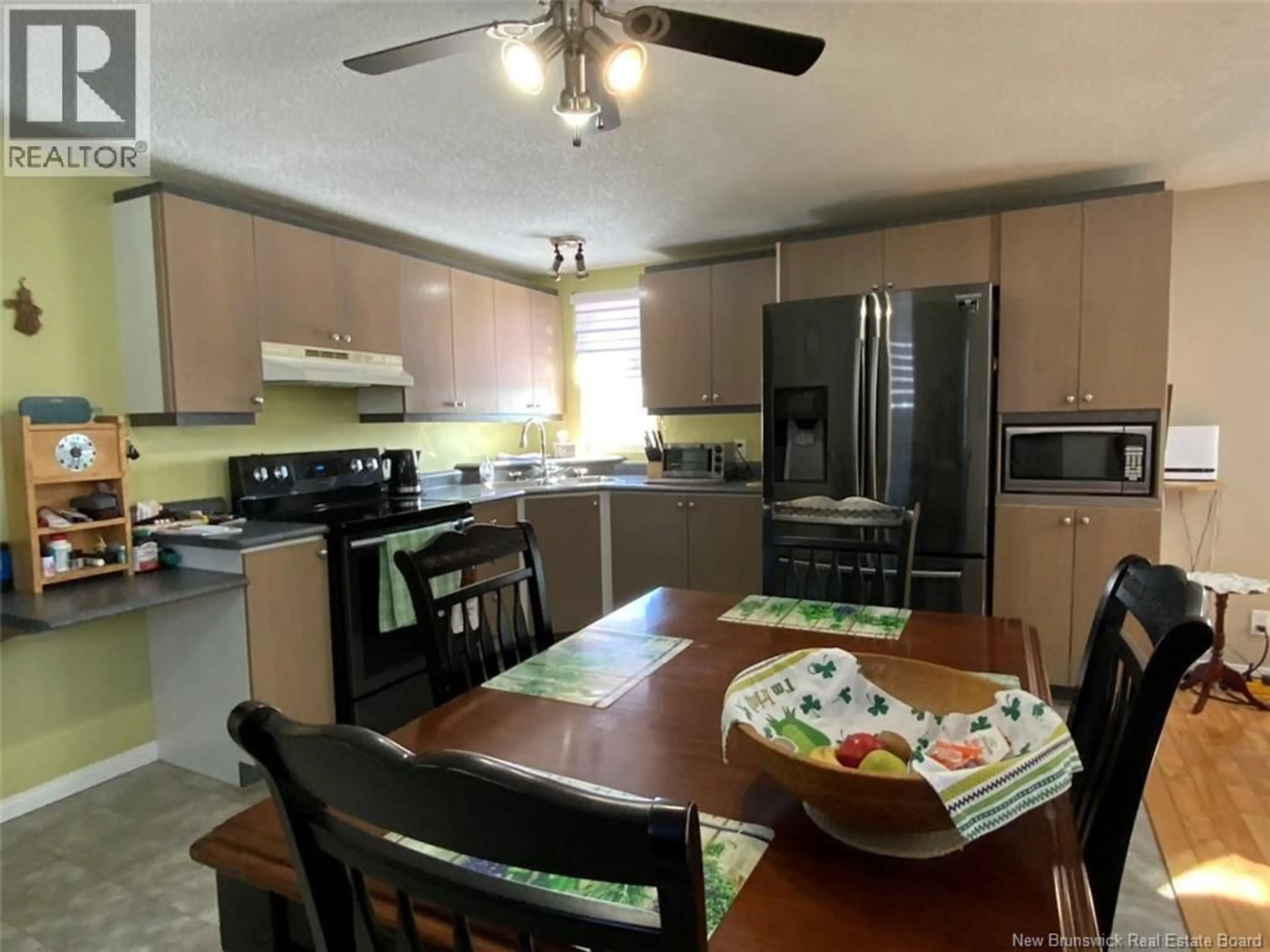 Open concept kitchen, wood/laminate floor for 69 LOUIS-MERCURE AVENUE, Saint-Basile New Brunswick E7C2J3