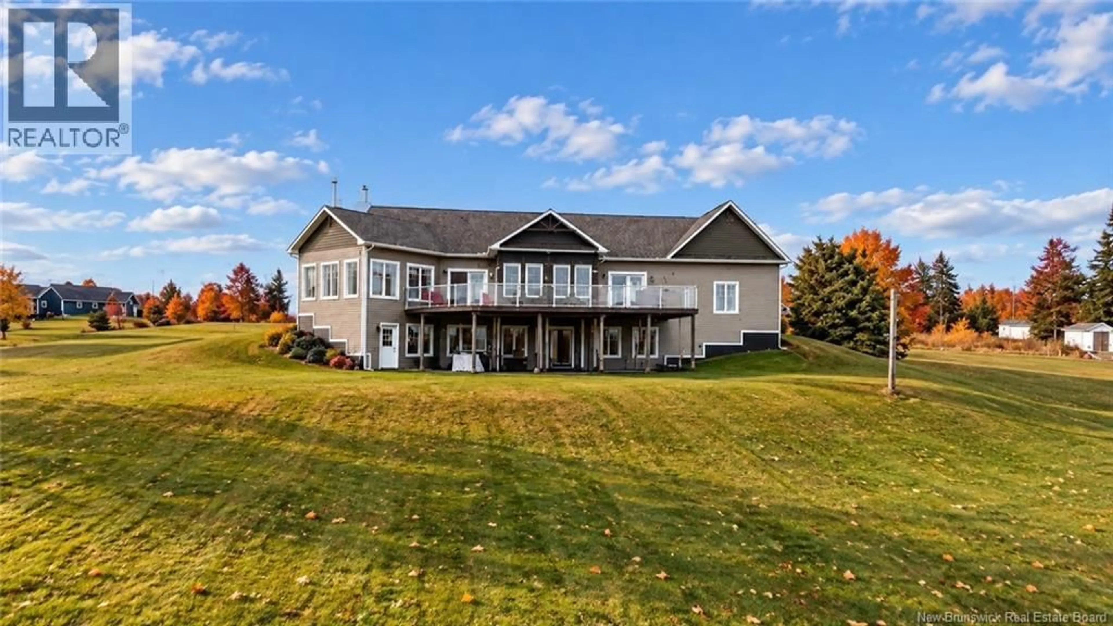 A pic from outside/outdoor area/front of a property/back of a property/a pic from drone, water/lake/river/ocean view for 20 ISLANDVIEW LANE, Main River New Brunswick E4T0B1