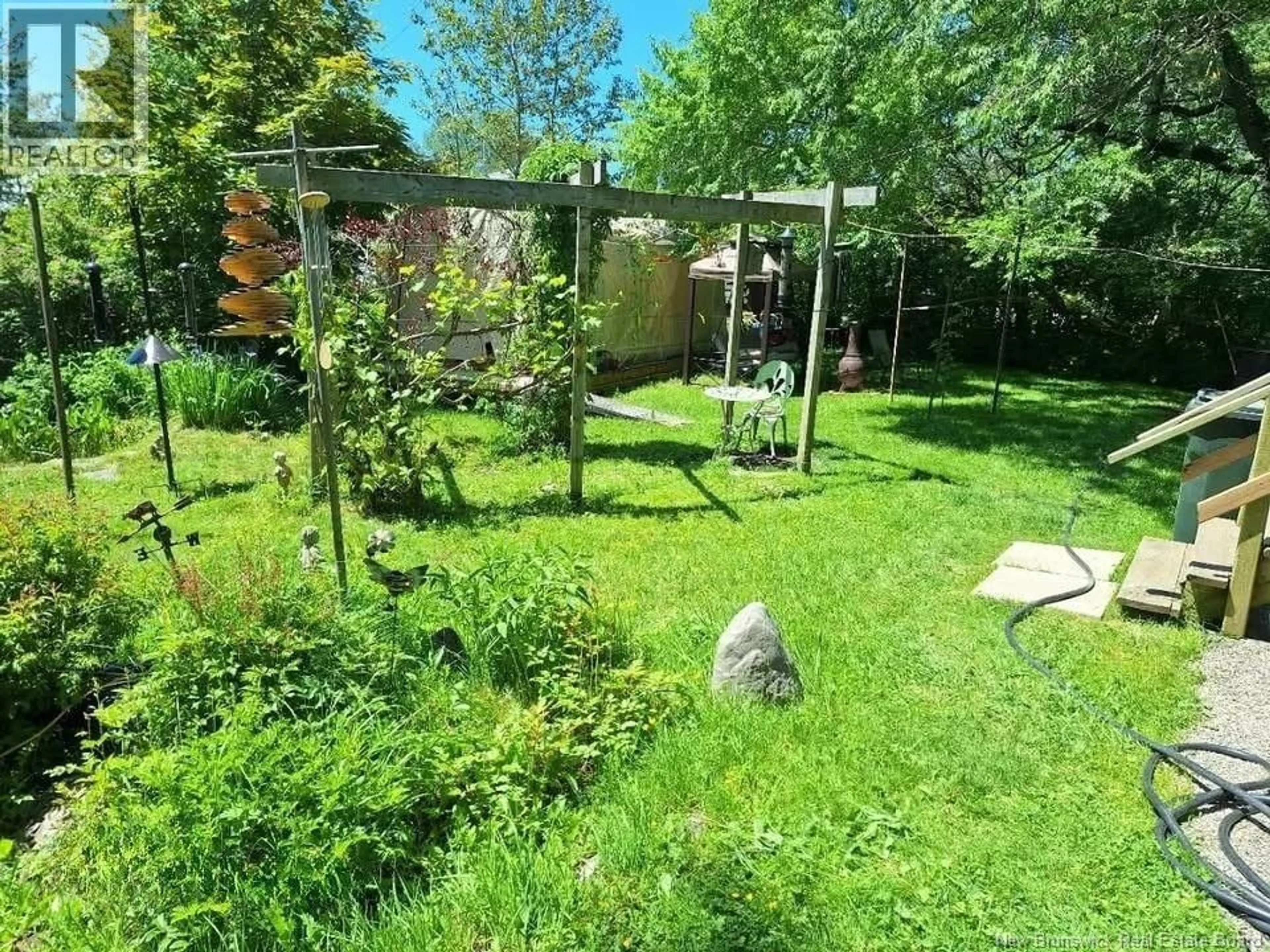 A pic from outside/outdoor area/front of a property/back of a property/a pic from drone, forest/trees view for 51-53 SIMPSON DRIVE, Saint John New Brunswick E2H2B8