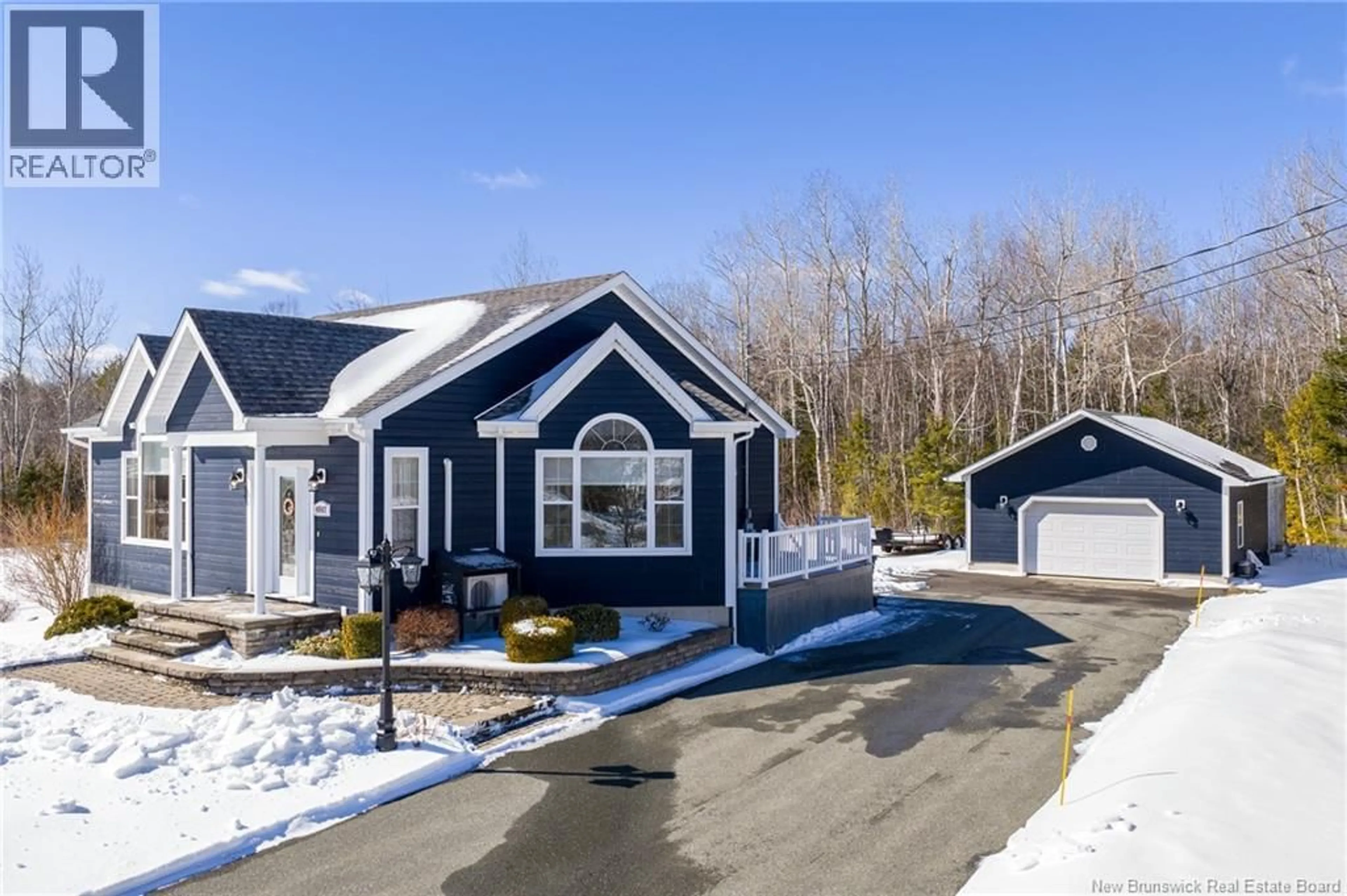 Home with vinyl exterior material, street for 4867 ROUTE 11, Brantville New Brunswick E9H1M3