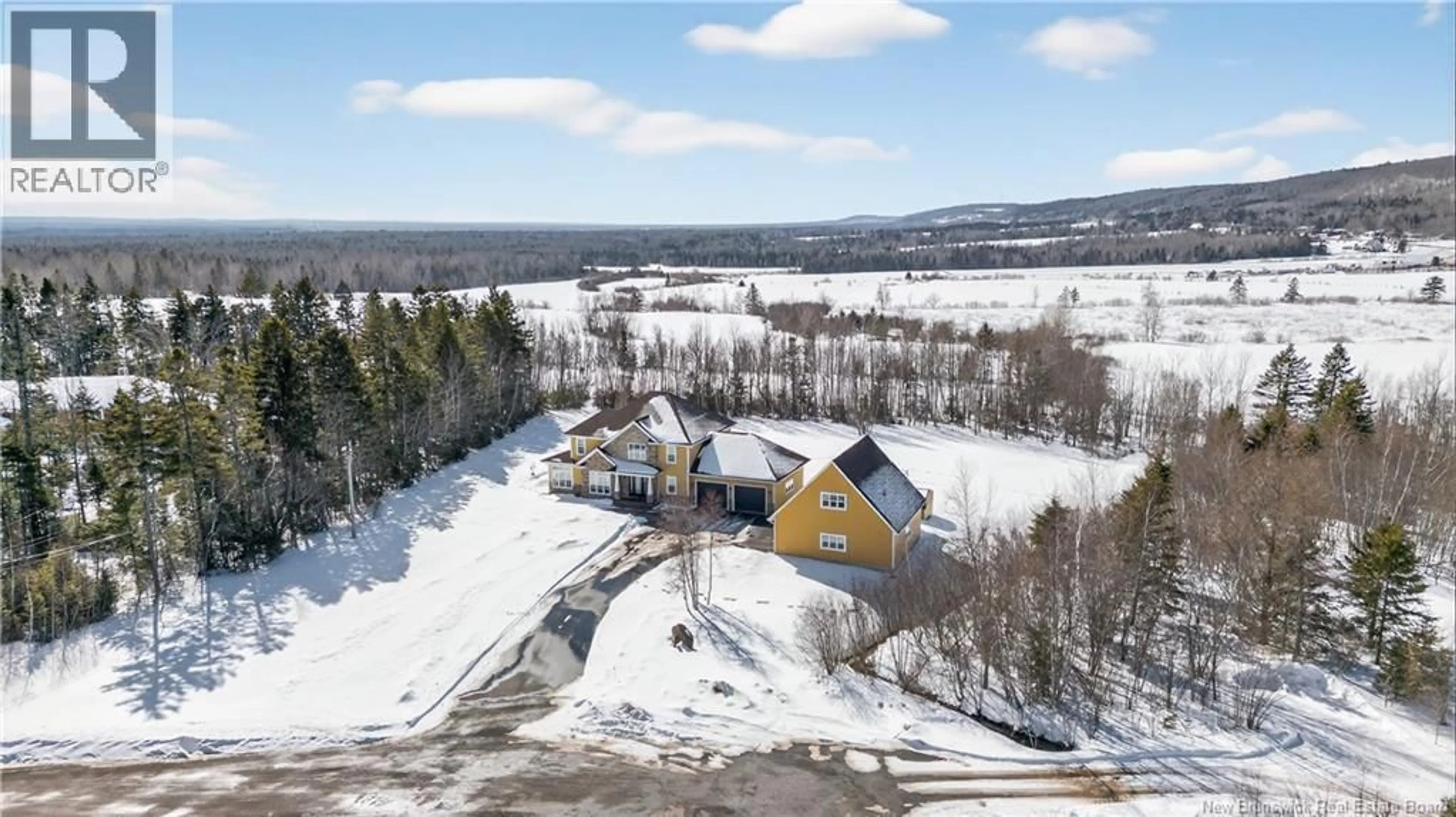 A pic from outside/outdoor area/front of a property/back of a property/a pic from drone, mountain view for 31 MILLSTONE COURT, Ammon New Brunswick E1G0V4