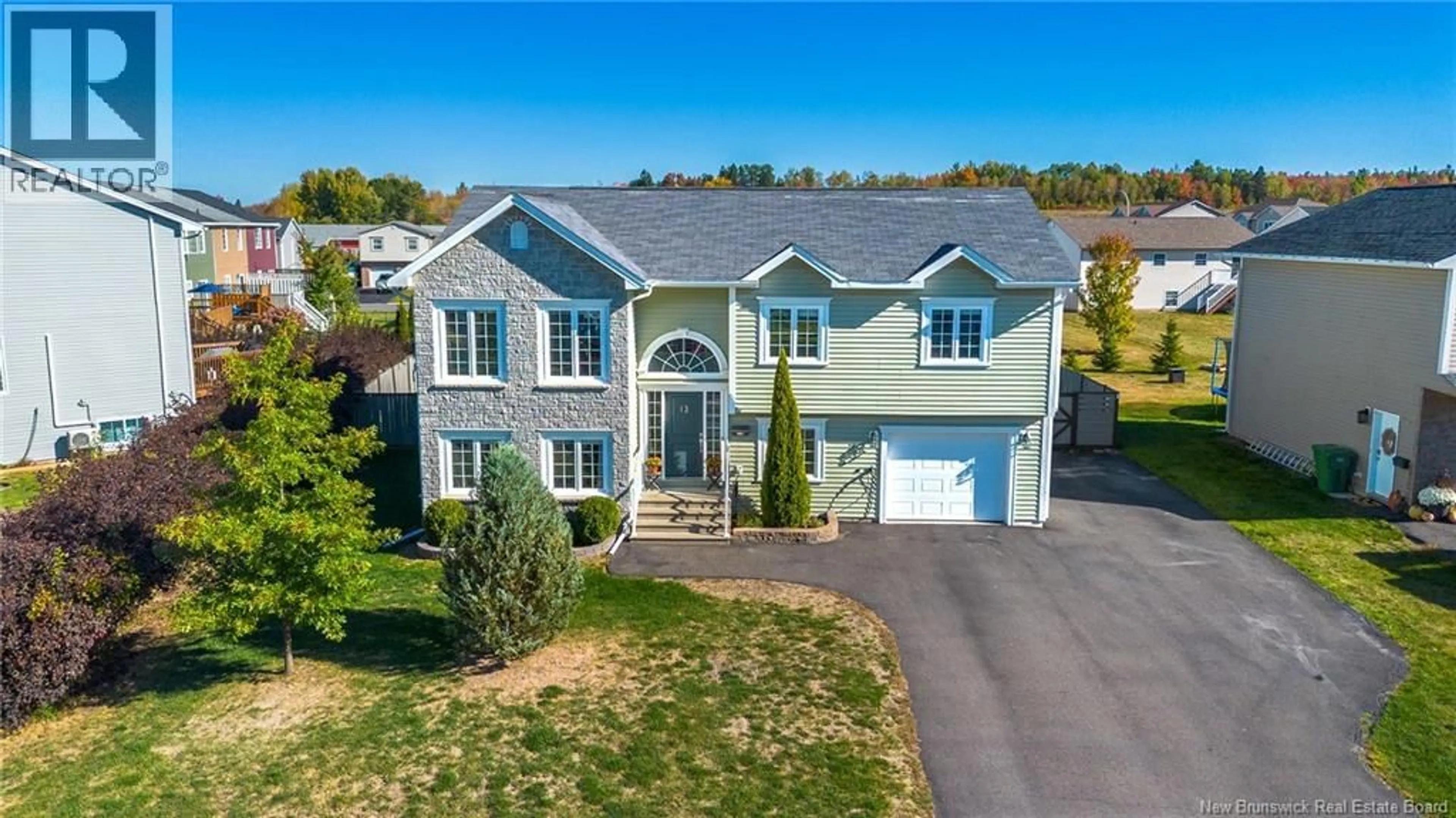 A pic from outside/outdoor area/front of a property/back of a property/a pic from drone, street for 13 CARTER CRESCENT, Oromocto New Brunswick E2V0C4