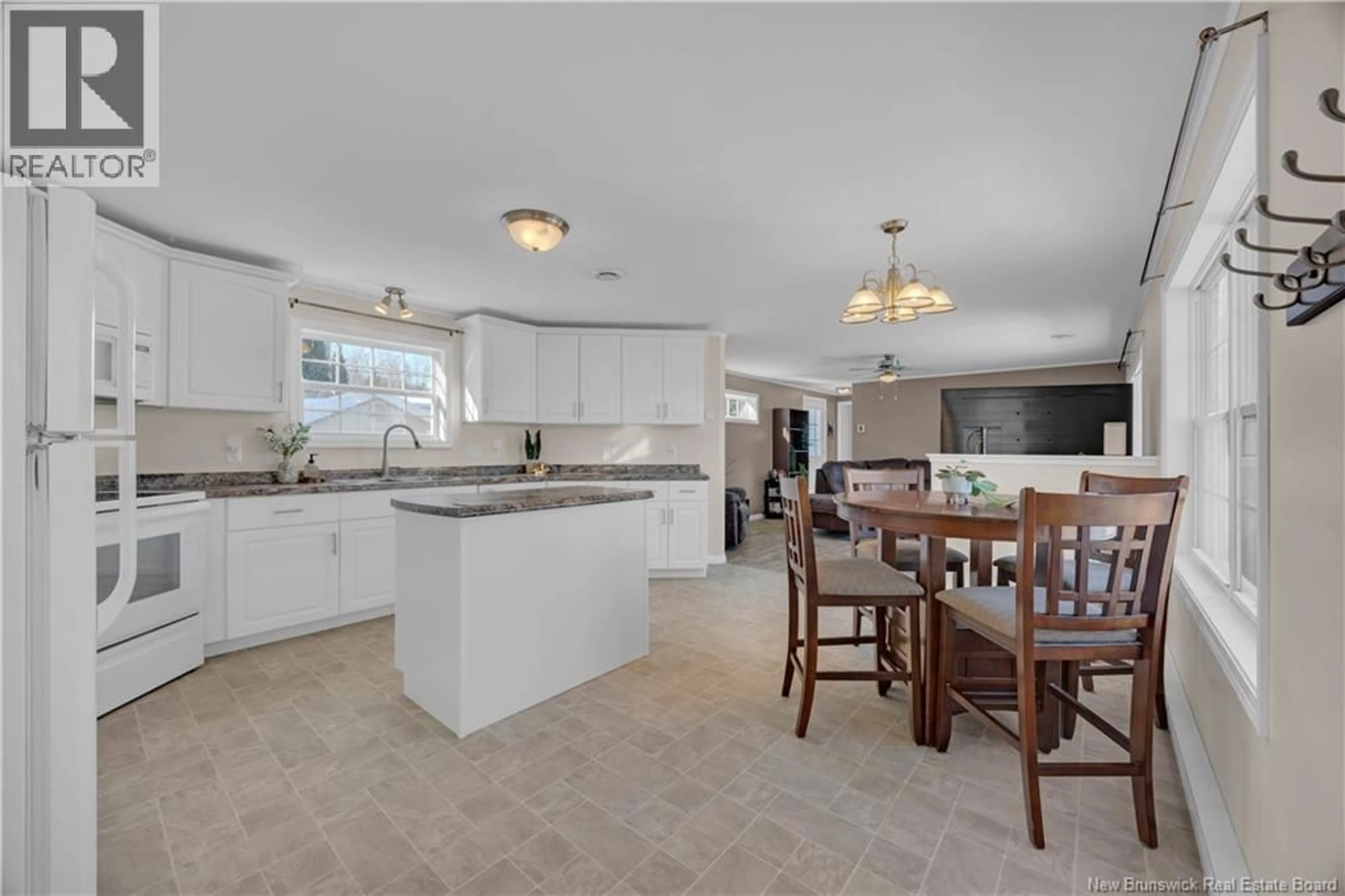 Open concept kitchen, ceramic/tile floor for 15 SITKA LANE, Quispamsis New Brunswick E2G1W9