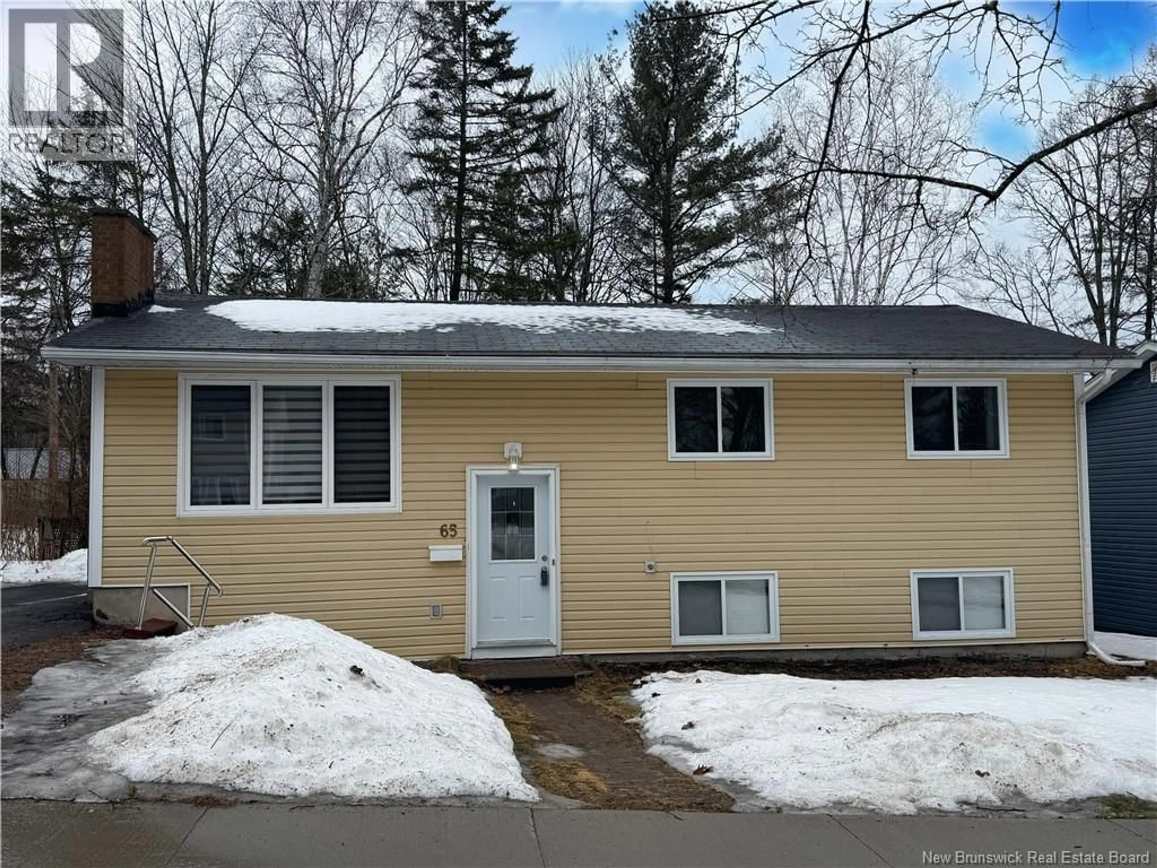 Home with vinyl exterior material, street for 65 RANKINE STREET, Fredericton New Brunswick E3B4S2