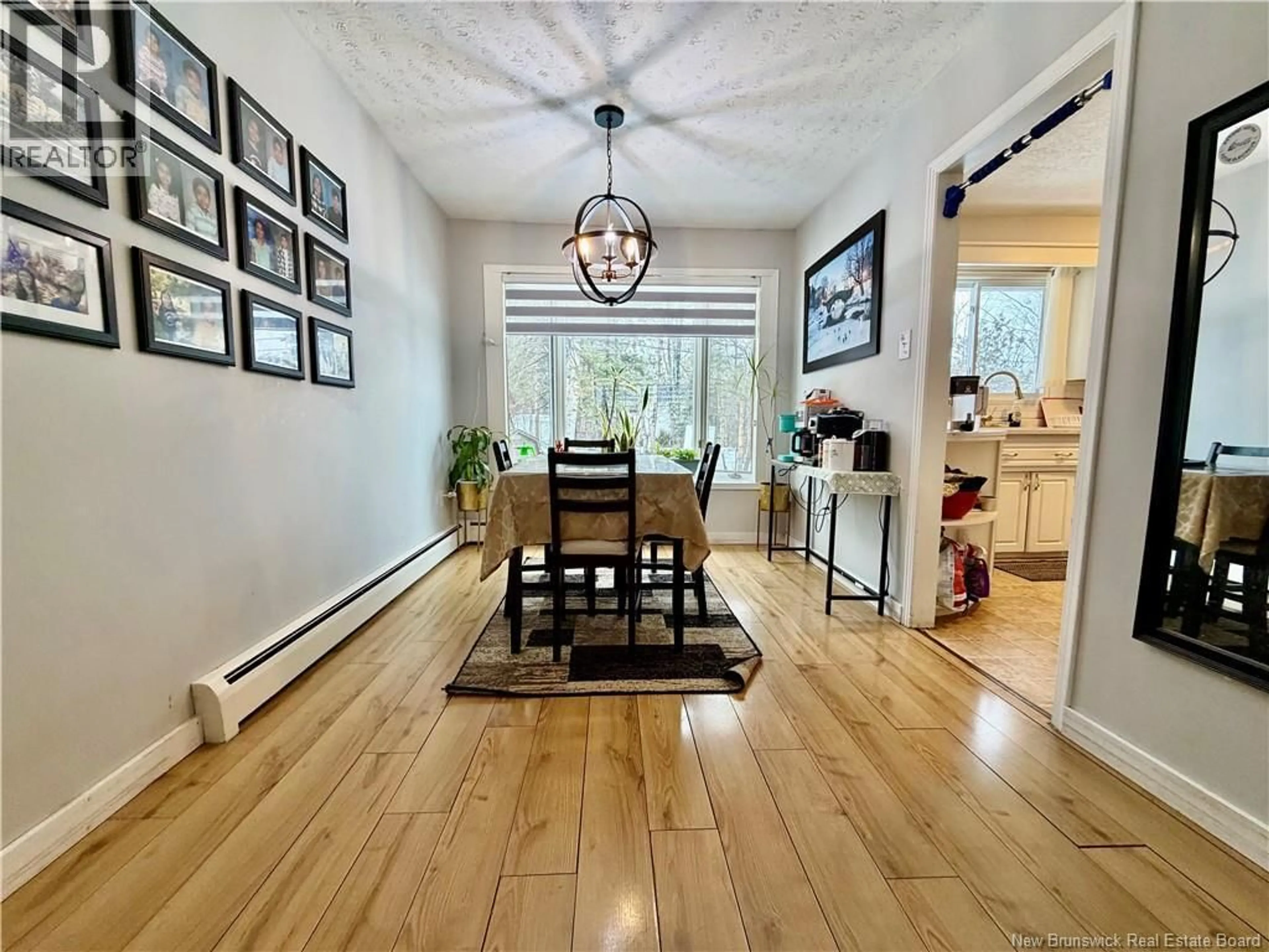 Dining room, wood/laminate floor for 65 RANKINE STREET, Fredericton New Brunswick E3B4S2