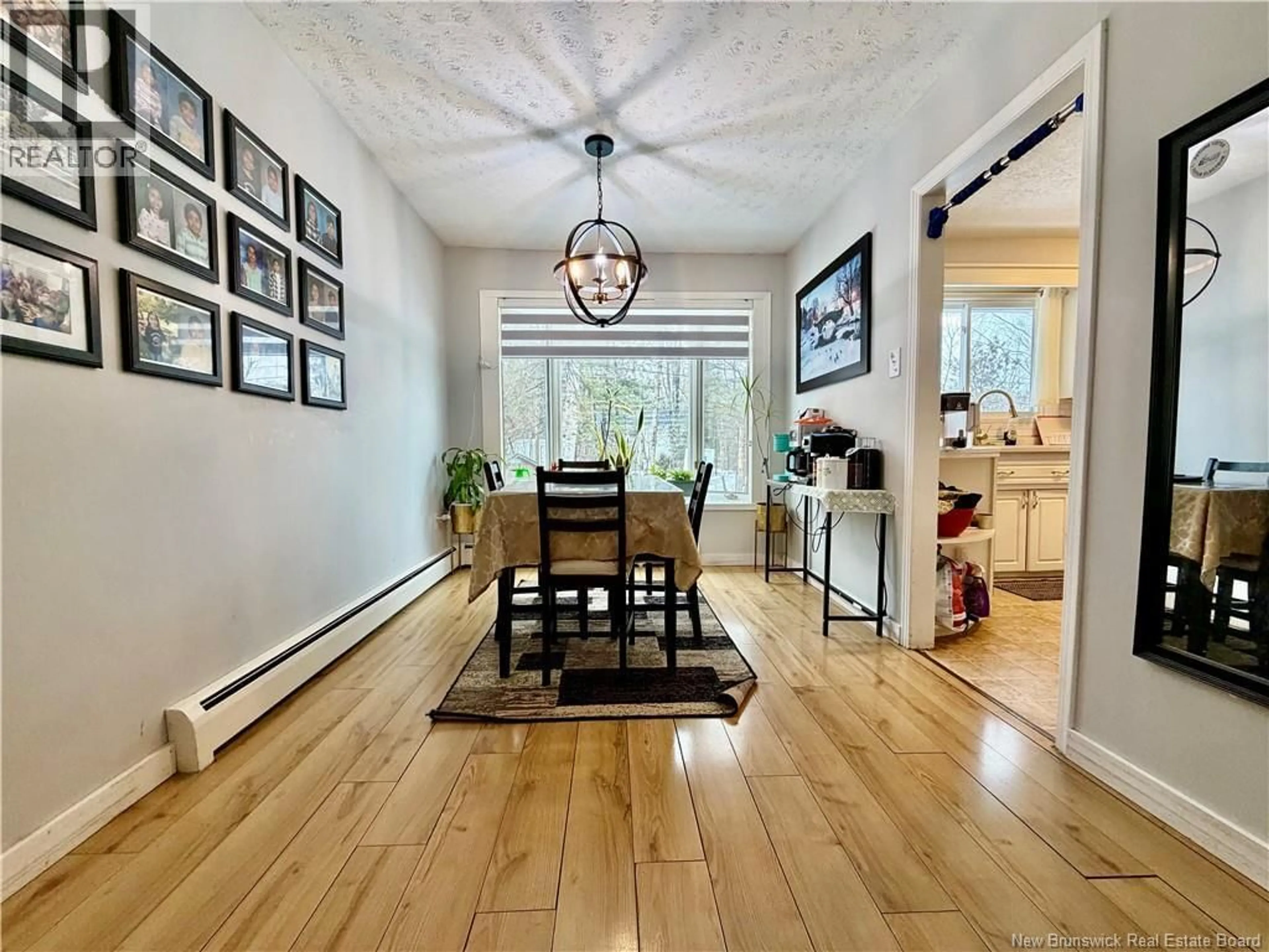 Dining room, wood/laminate floor for 65 RANKINE STREET, Fredericton New Brunswick E3B4S2