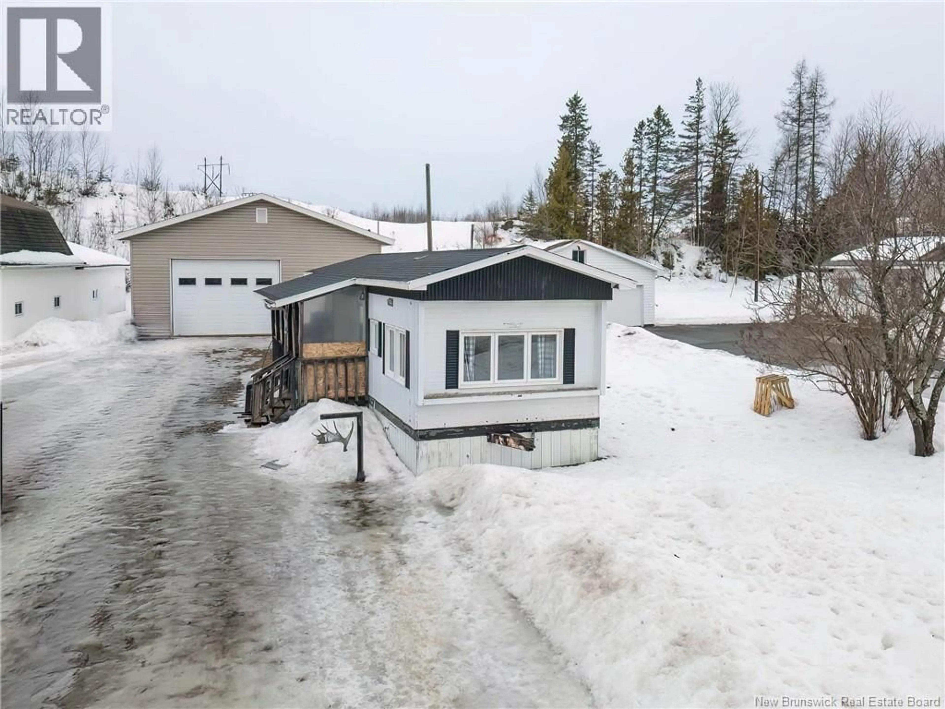 A pic from outside/outdoor area/front of a property/back of a property/a pic from drone, street for 16 GRENIER STREET, Saint-André New Brunswick E3Y3B1