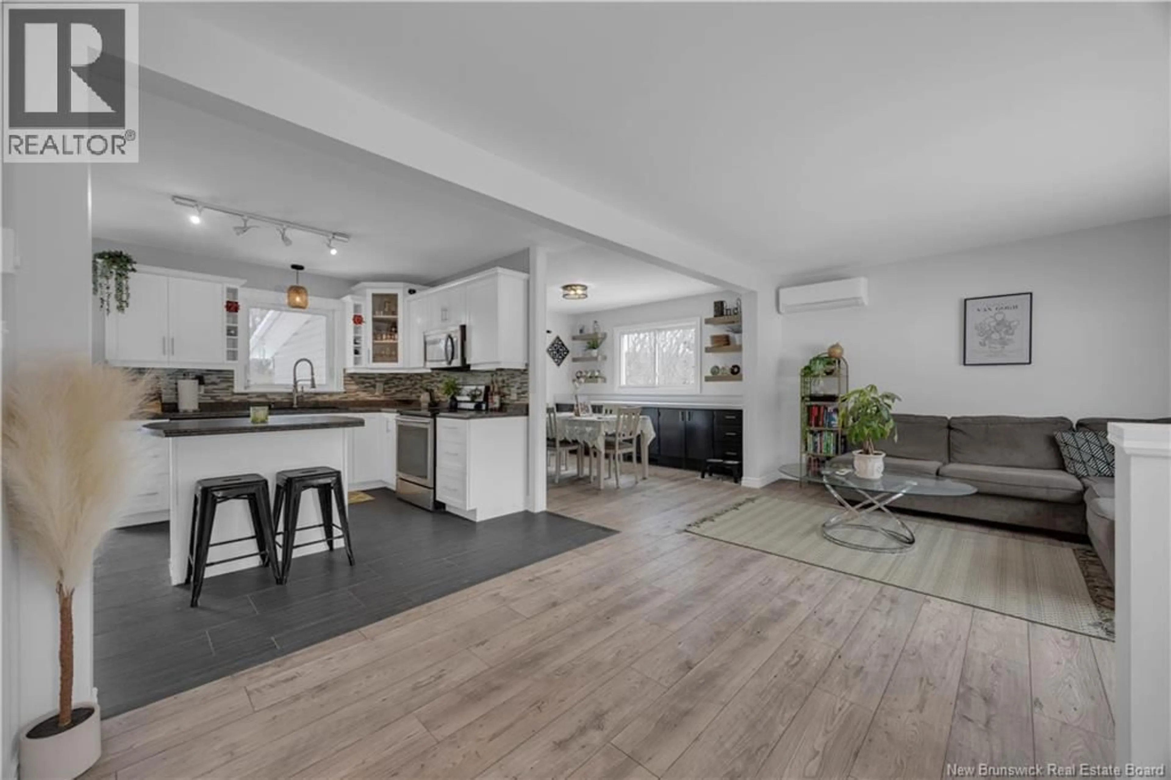 Open concept kitchen, wood/laminate floor for 19 TITUS CRESCENT, Quispamsis New Brunswick E2E1C2