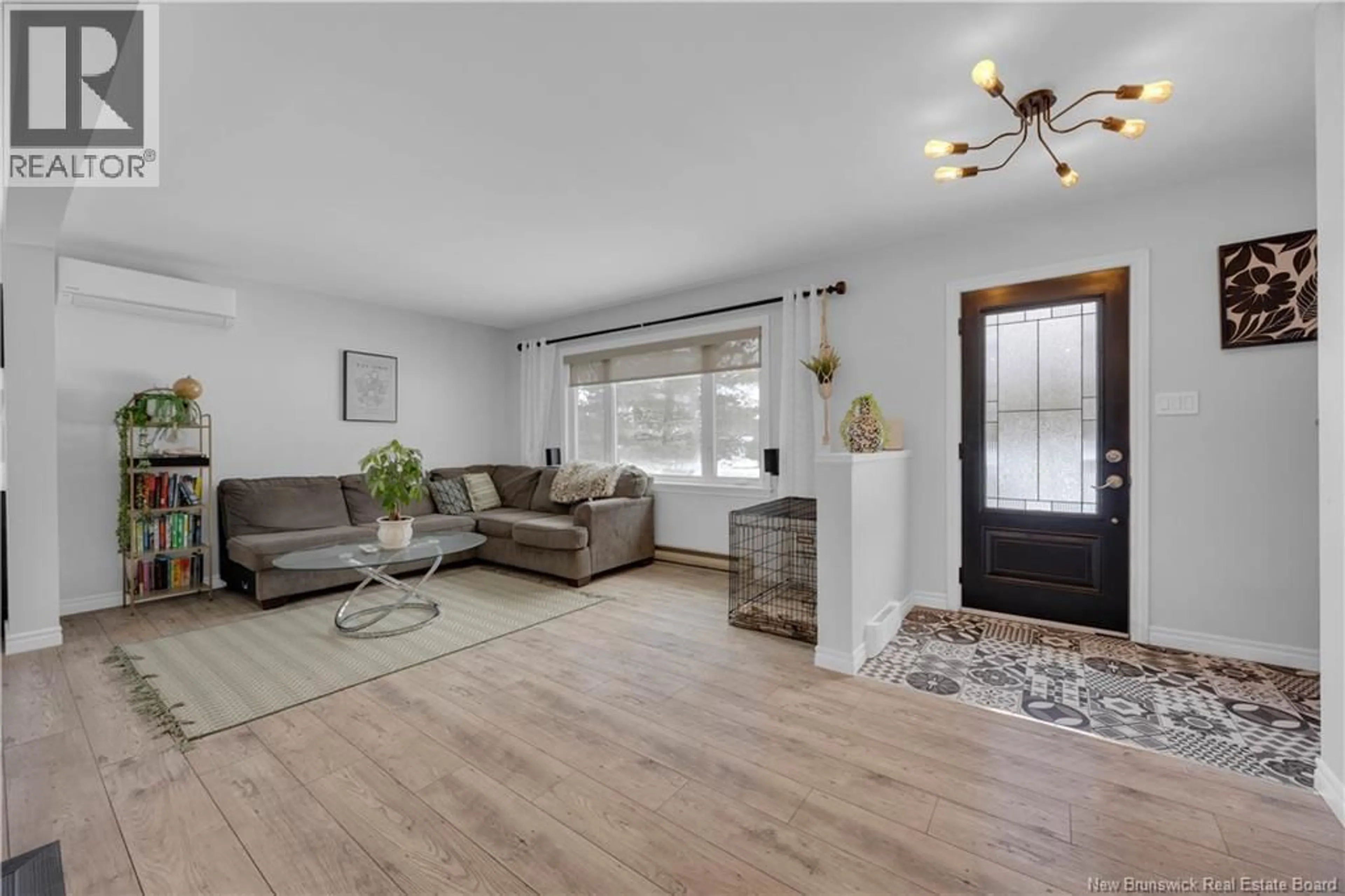 Living room with furniture, wood/laminate floor for 19 TITUS CRESCENT, Quispamsis New Brunswick E2E1C2