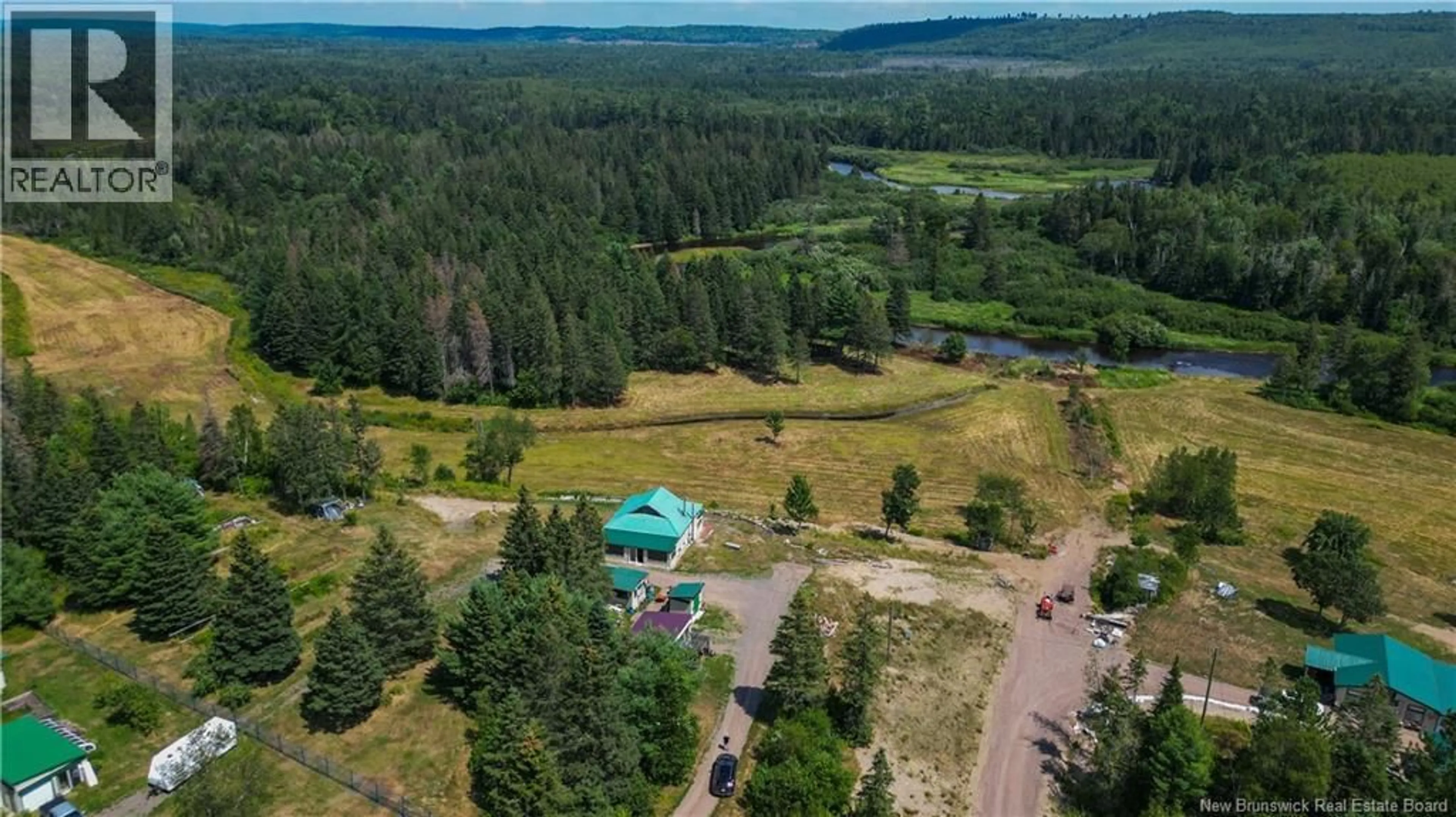 A pic from outside/outdoor area/front of a property/back of a property/a pic from drone, forest/trees view for 4199 ROUTE 3, Brockway New Brunswick E6K1Y3
