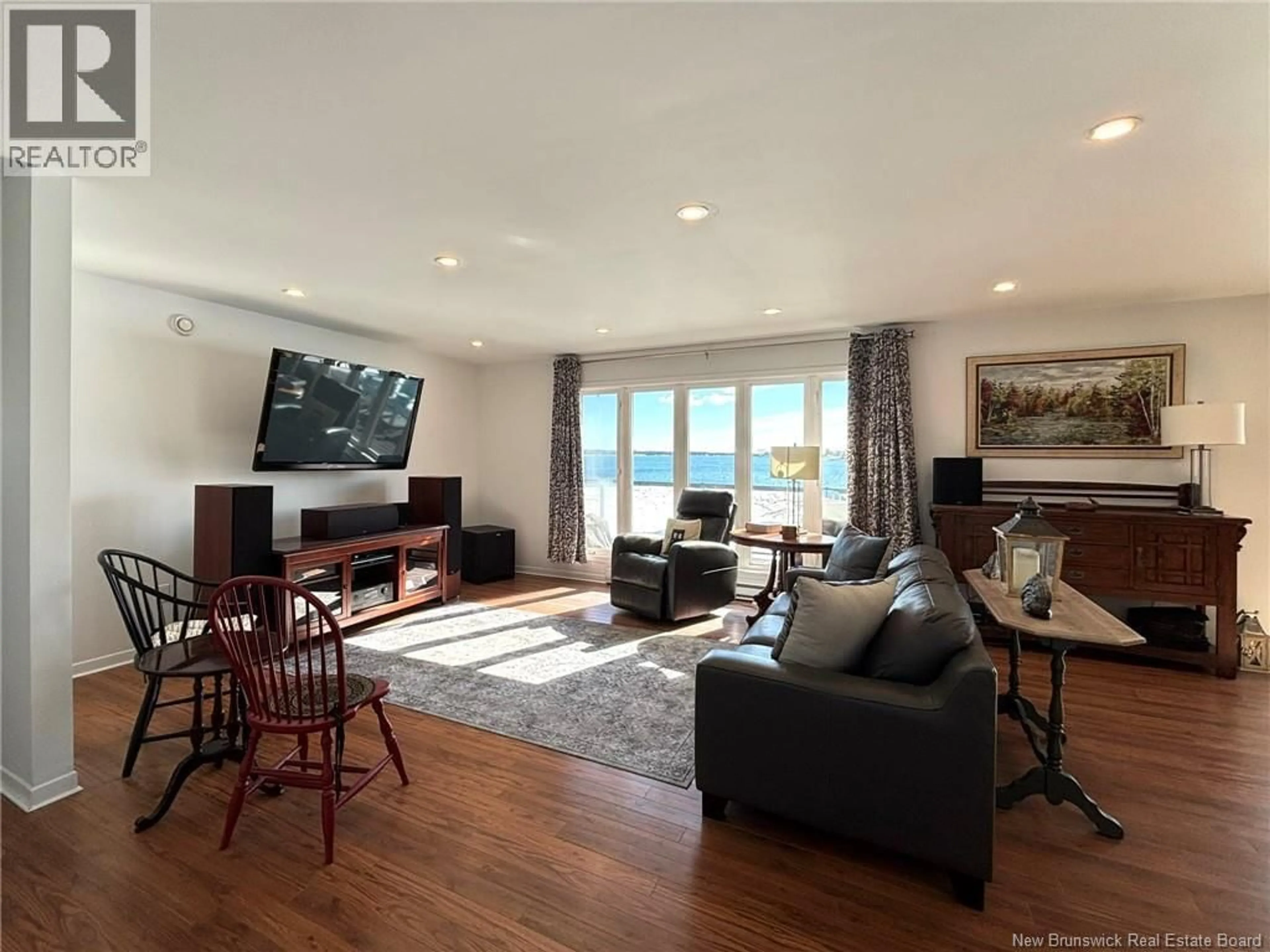 Living room with furniture, wood/laminate floor for 161 INGALLS HEAD ROAD, Grand Manan New Brunswick E5G3G5