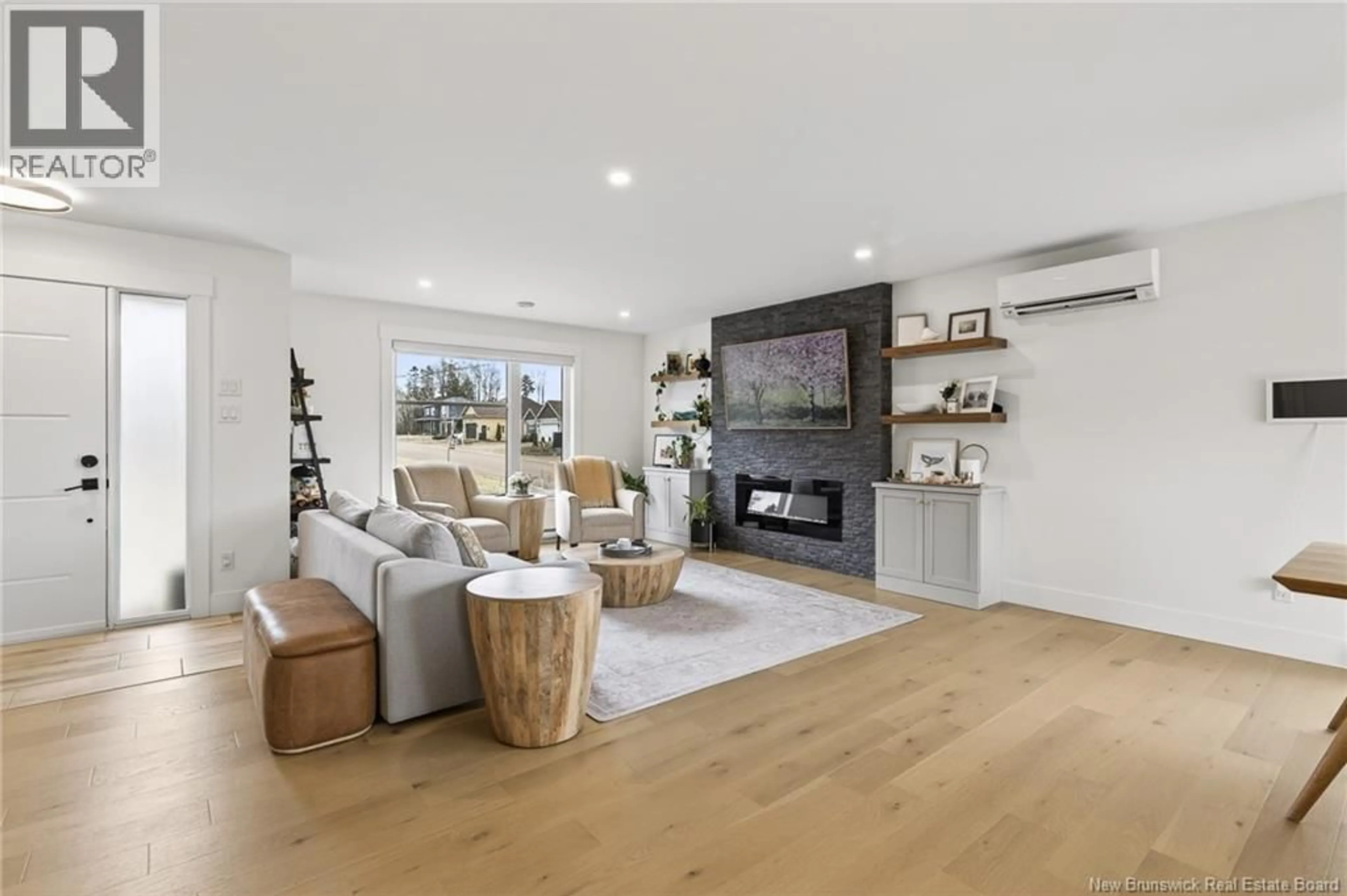 Living room with furniture, wood/laminate floor for 458 GASPÉ STREET, Dieppe New Brunswick E1A6V8