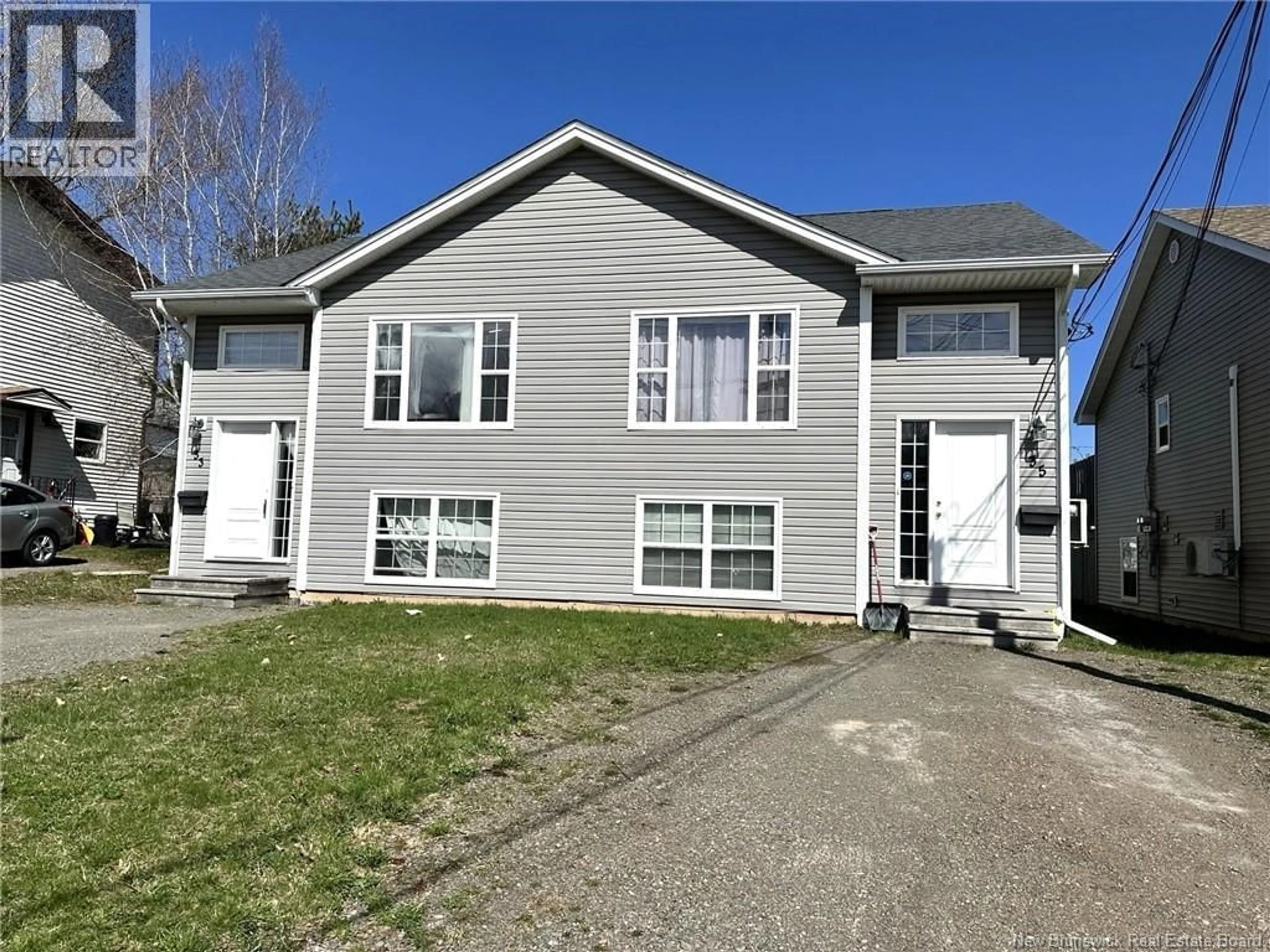 Home with vinyl exterior material, street for 33-35 BARNABY STREET, Moncton New Brunswick E1A4G6