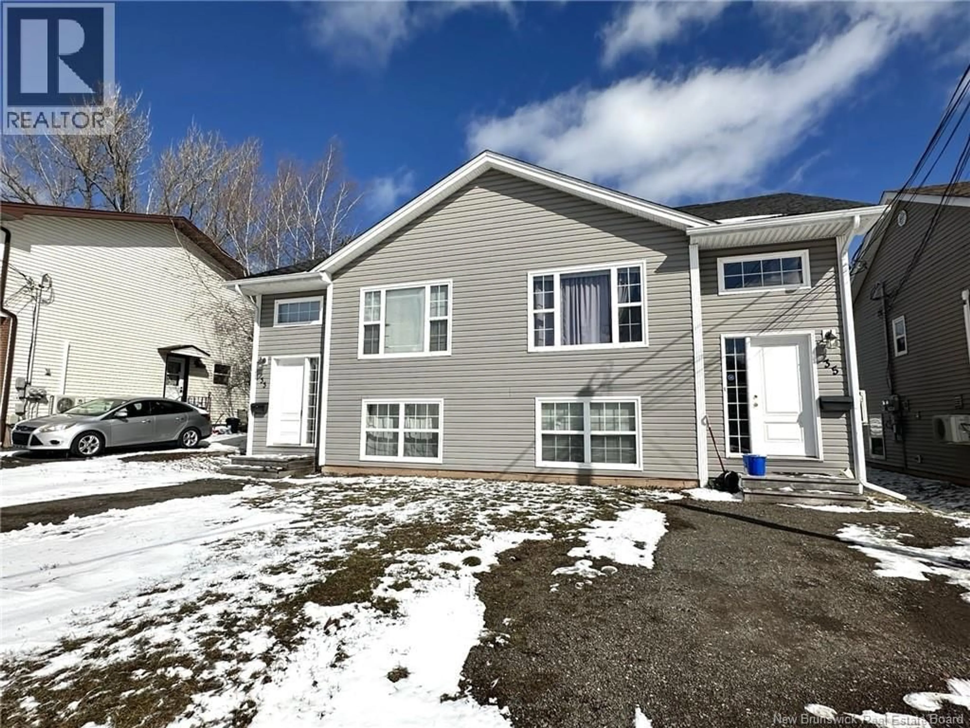 Home with vinyl exterior material, street for 33-35 BARNABY STREET, Moncton New Brunswick E1A4G6