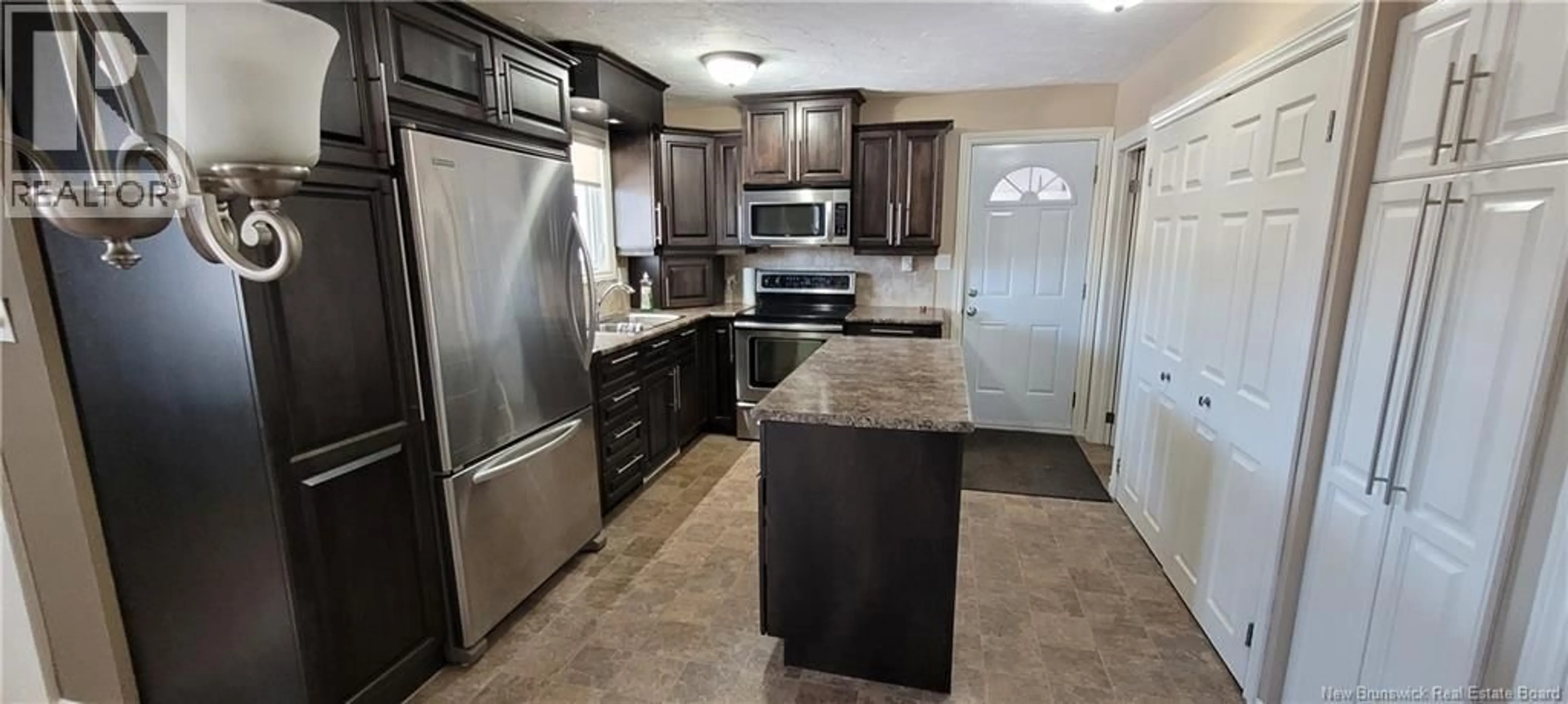 Open concept kitchen, ceramic/tile floor for 2023 AMIRAULT STREET, Dieppe New Brunswick E1A7J9