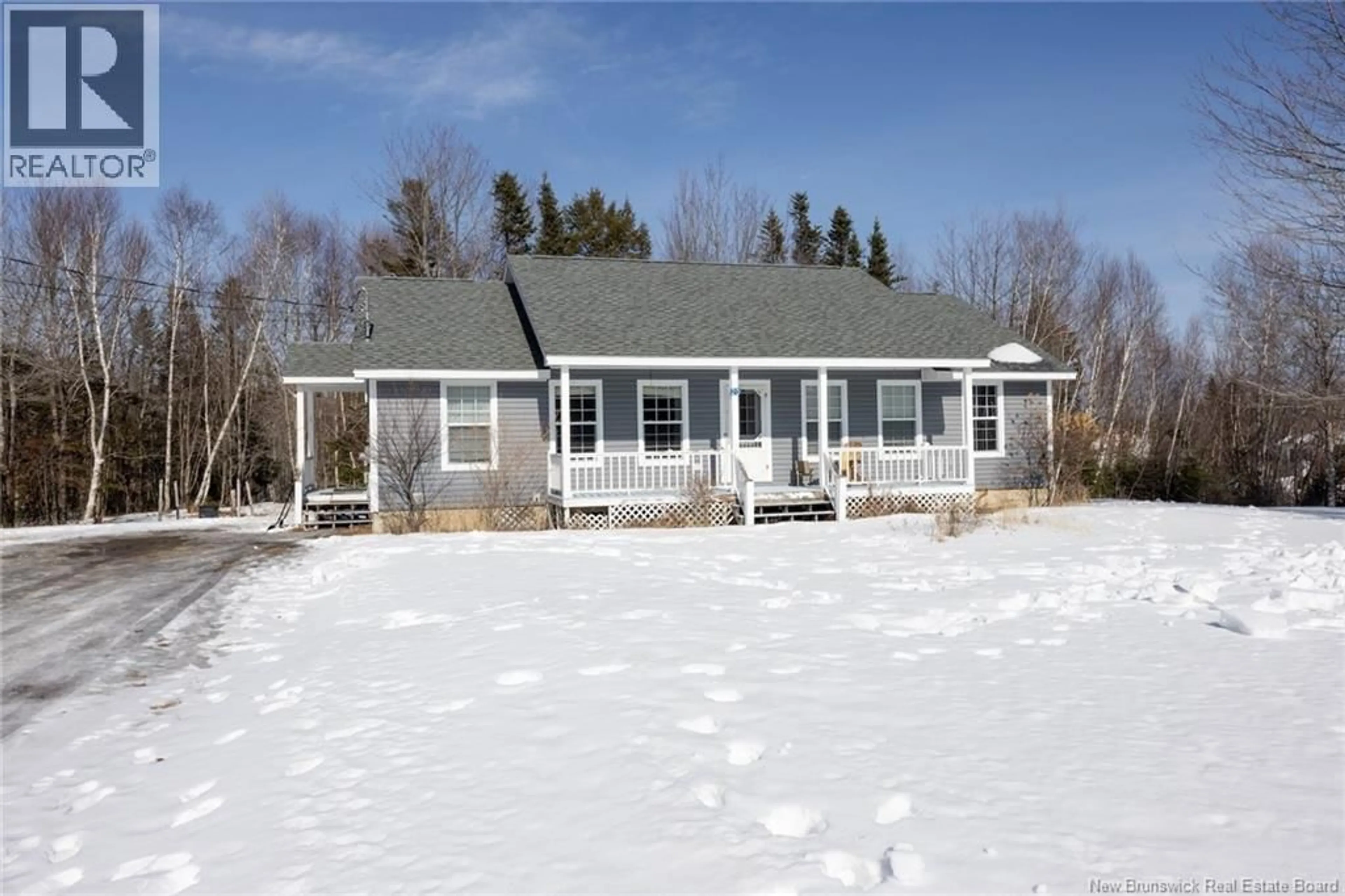 Home with vinyl exterior material, street for 20 MARIE LANE, Douglas New Brunswick E3G9P6