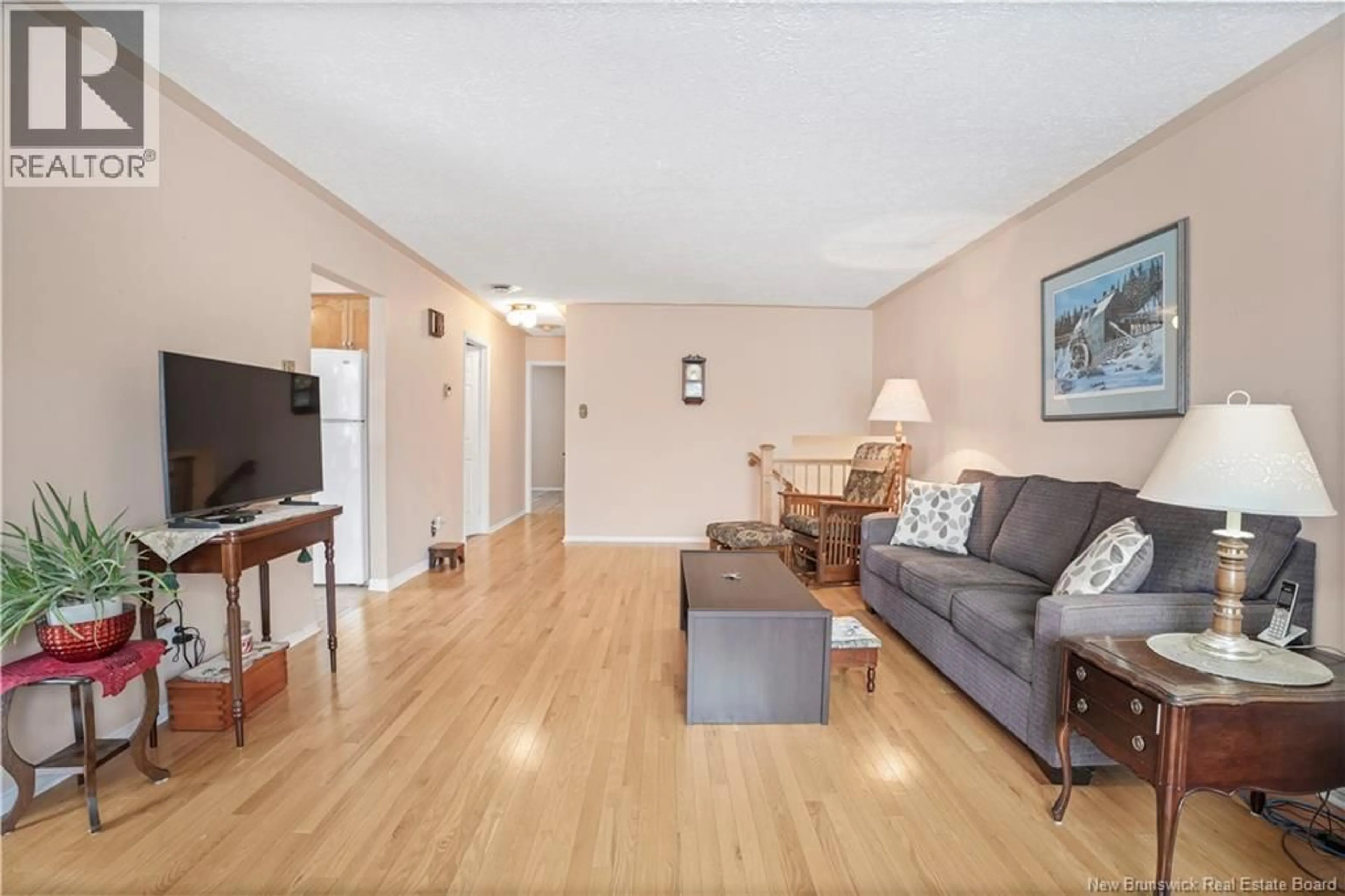 Living room with furniture, unknown for 34 HURON AVENUE, Fredericton New Brunswick E3A1J7