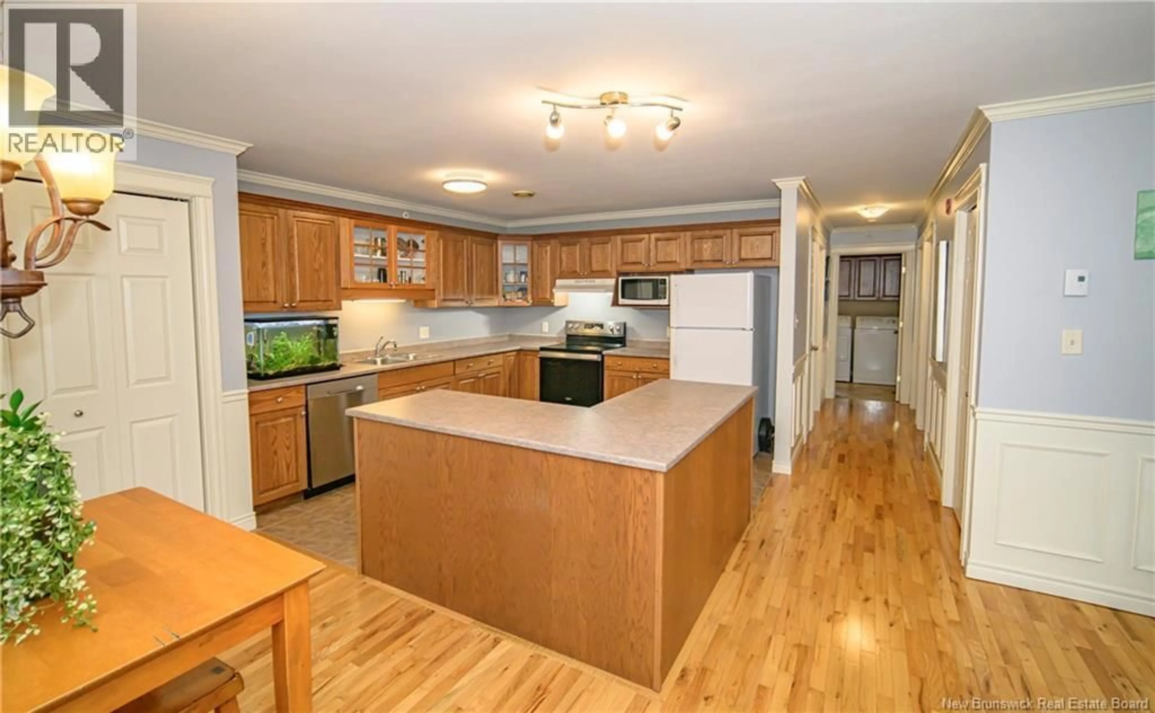 Open concept kitchen, wood/laminate floor for 56 - 51 LIAN STREET, Fredericton New Brunswick E3C0A2