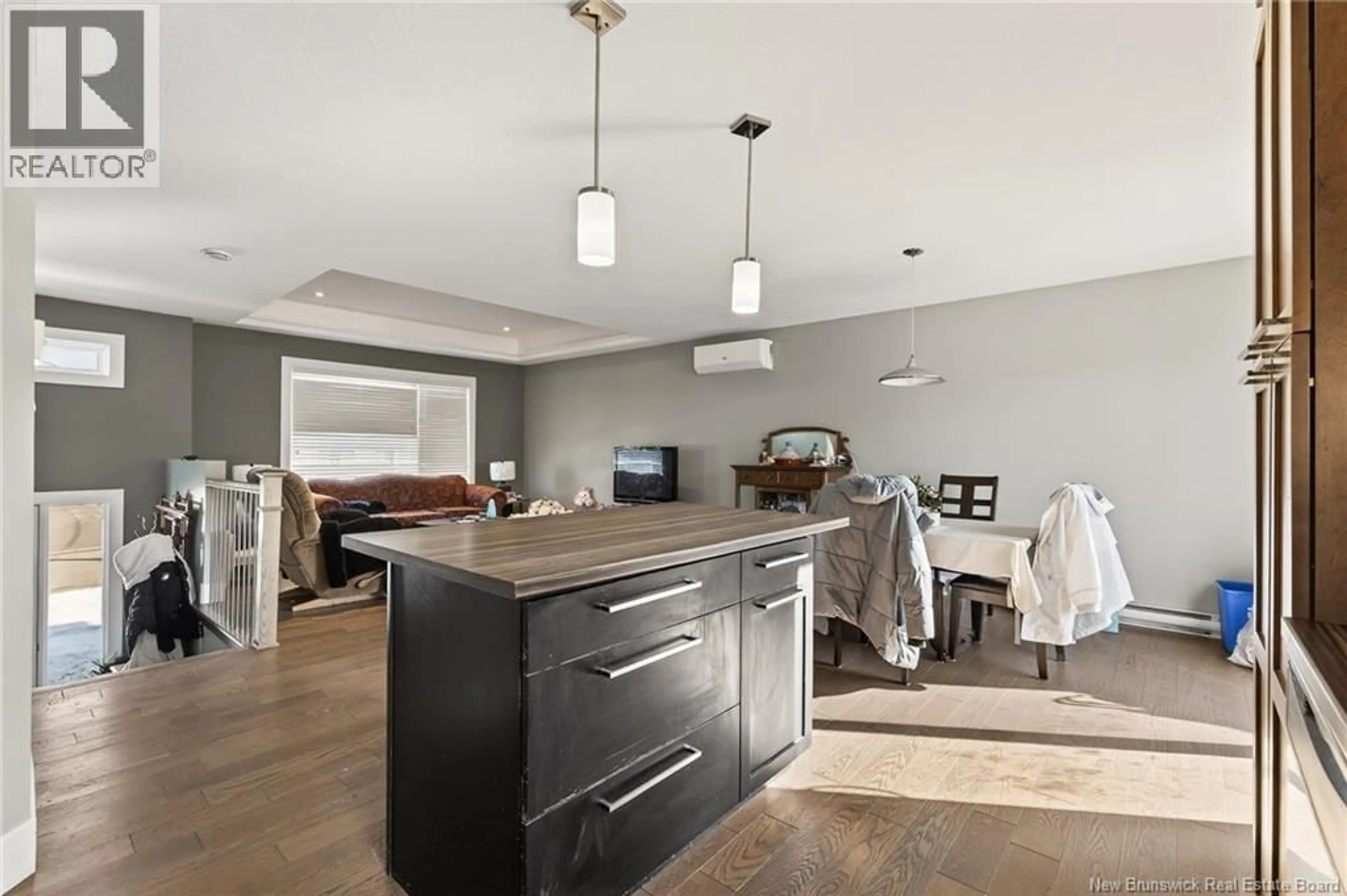 Open concept kitchen, wood/laminate floor for 95 DOIRON STREET, Dieppe New Brunswick E1A0X9