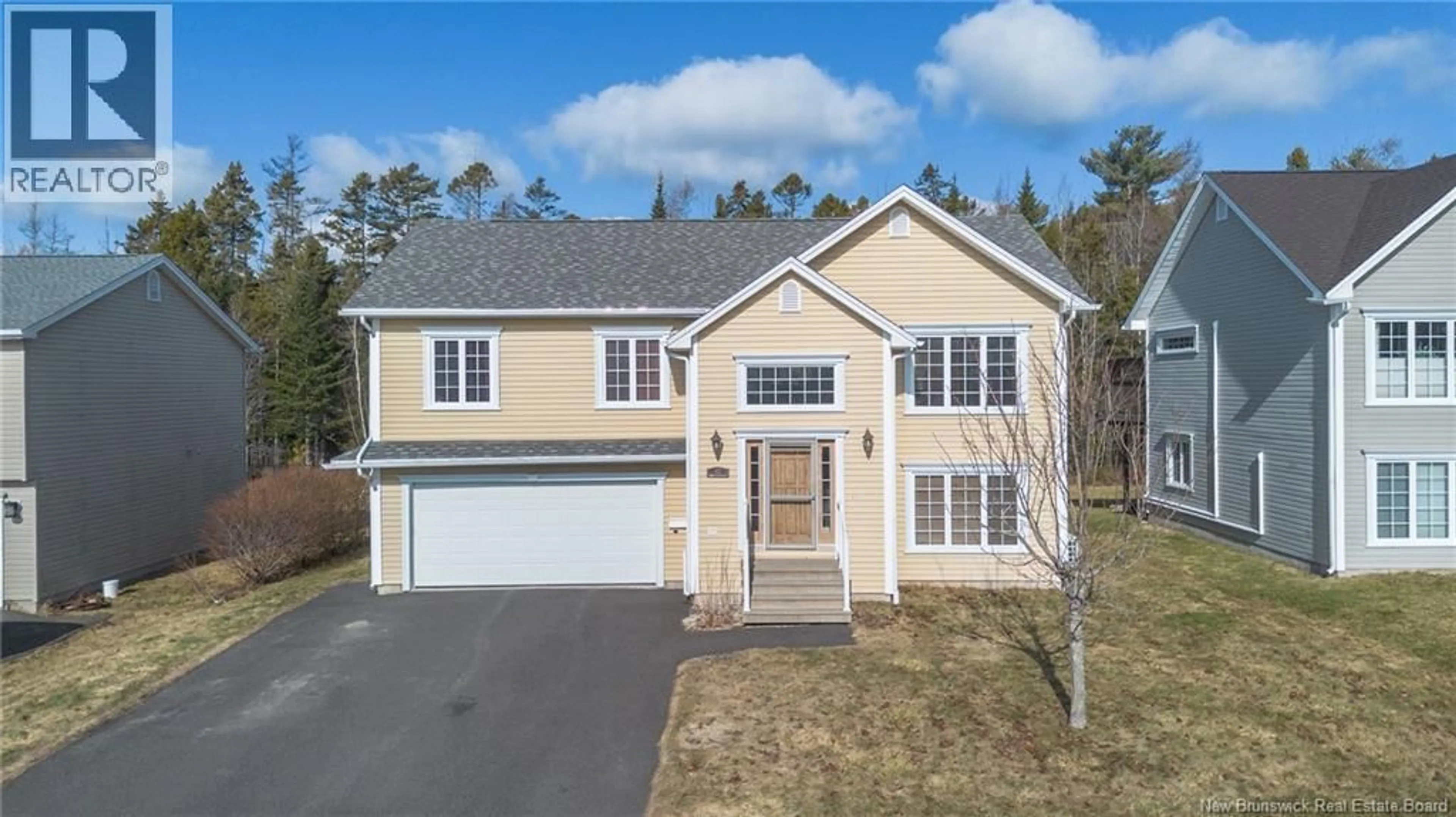 A pic from outside/outdoor area/front of a property/back of a property/a pic from drone, street for 65 DAWSON DRIVE, Oromocto New Brunswick E2V4S9