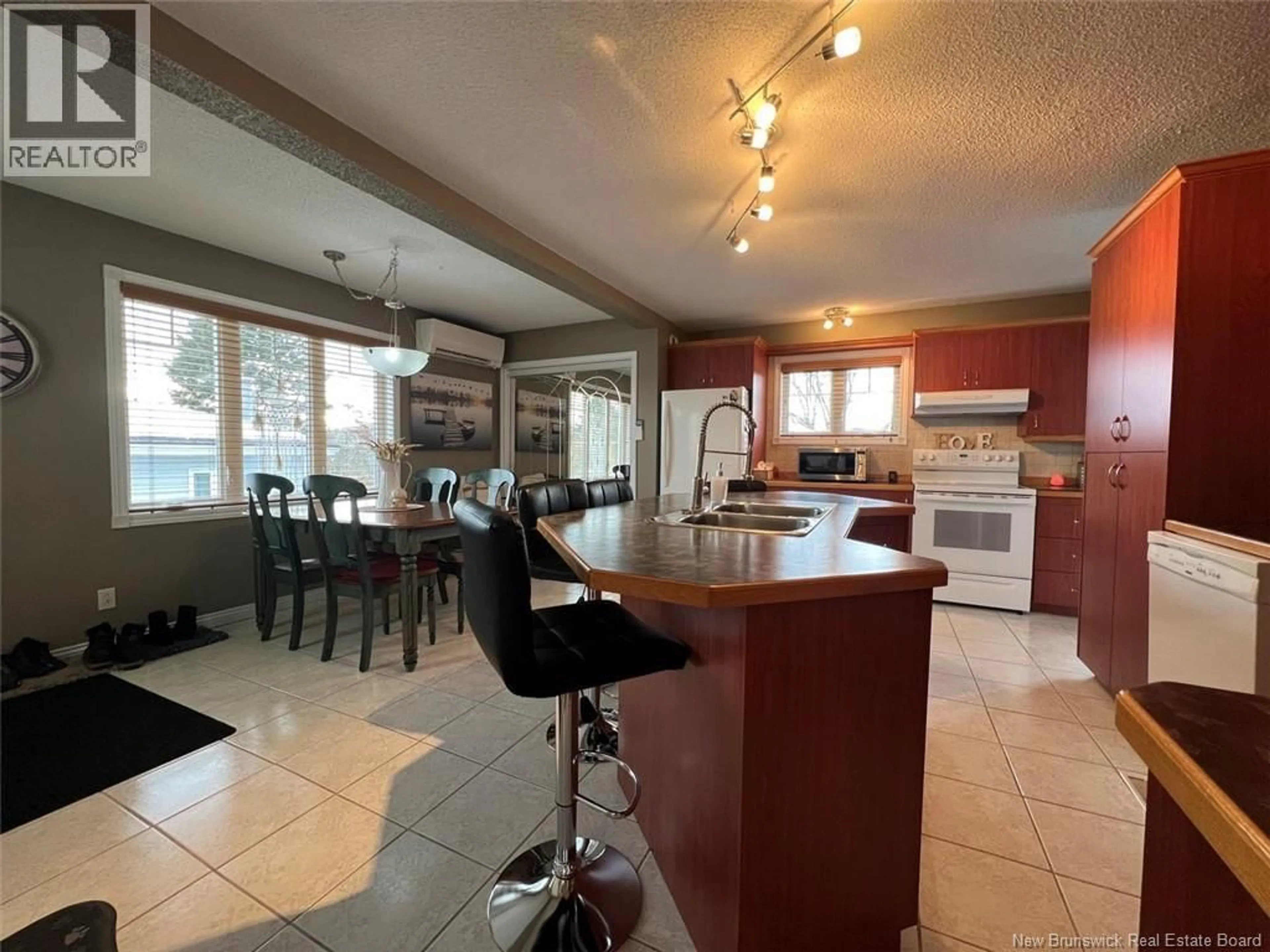 Open concept kitchen, ceramic/tile floor for 120 34TH AVENUE, Edmundston New Brunswick E3V2T6