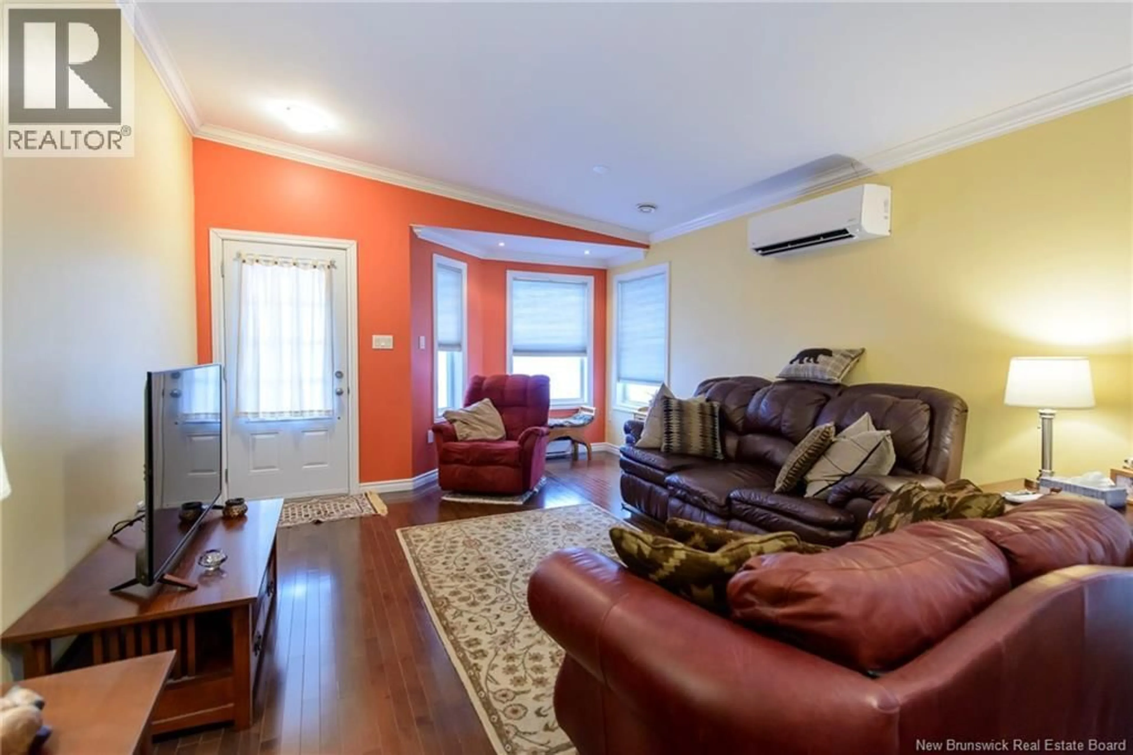 Living room with furniture, wood/laminate floor for 8 BERNICE COURT, Saint John New Brunswick E2J0J1