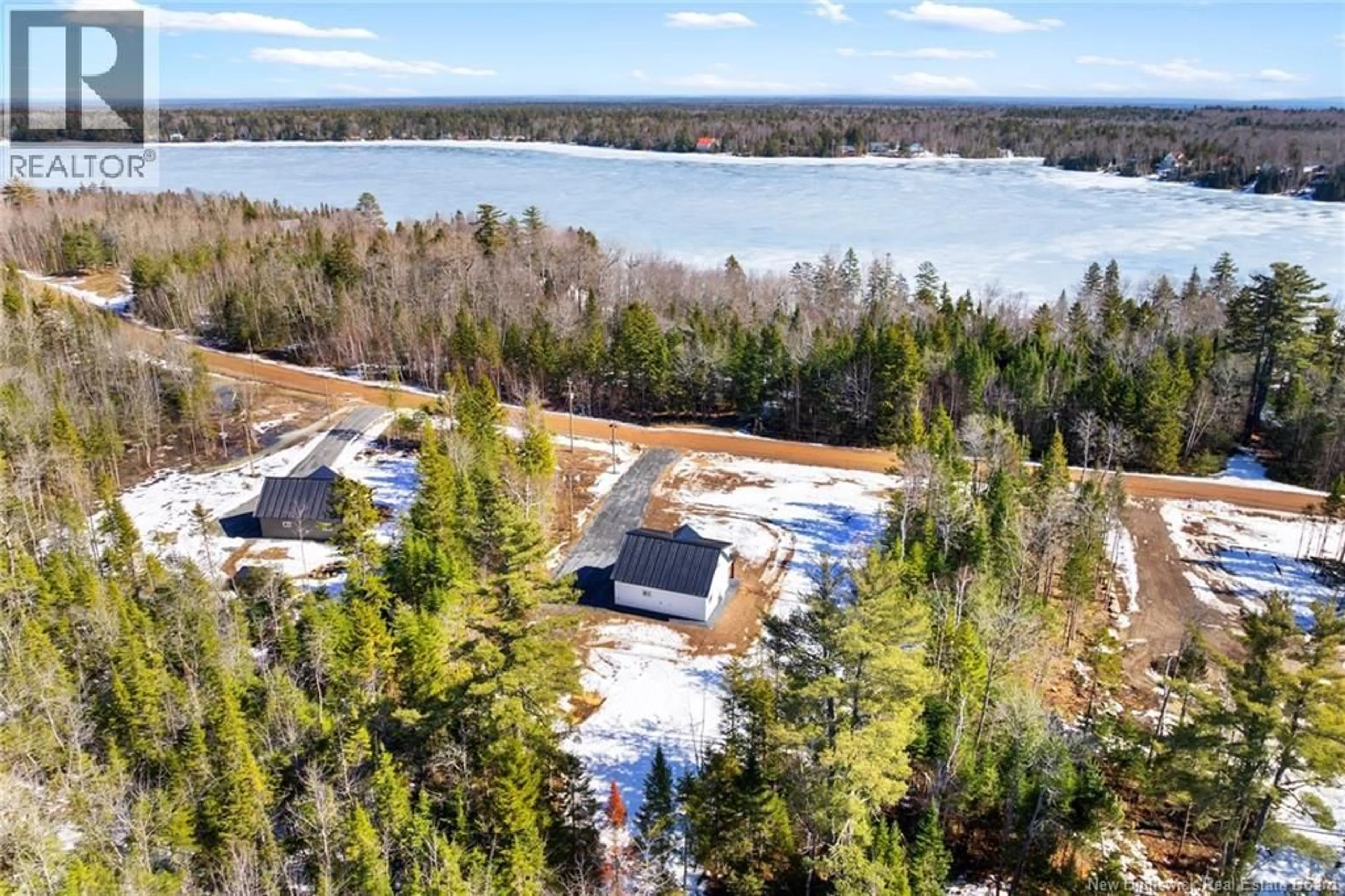 A pic from outside/outdoor area/front of a property/back of a property/a pic from drone, water/lake/river/ocean view for 120 JOHN CHESSIE DR, Yoho New Brunswick E6K2Z6