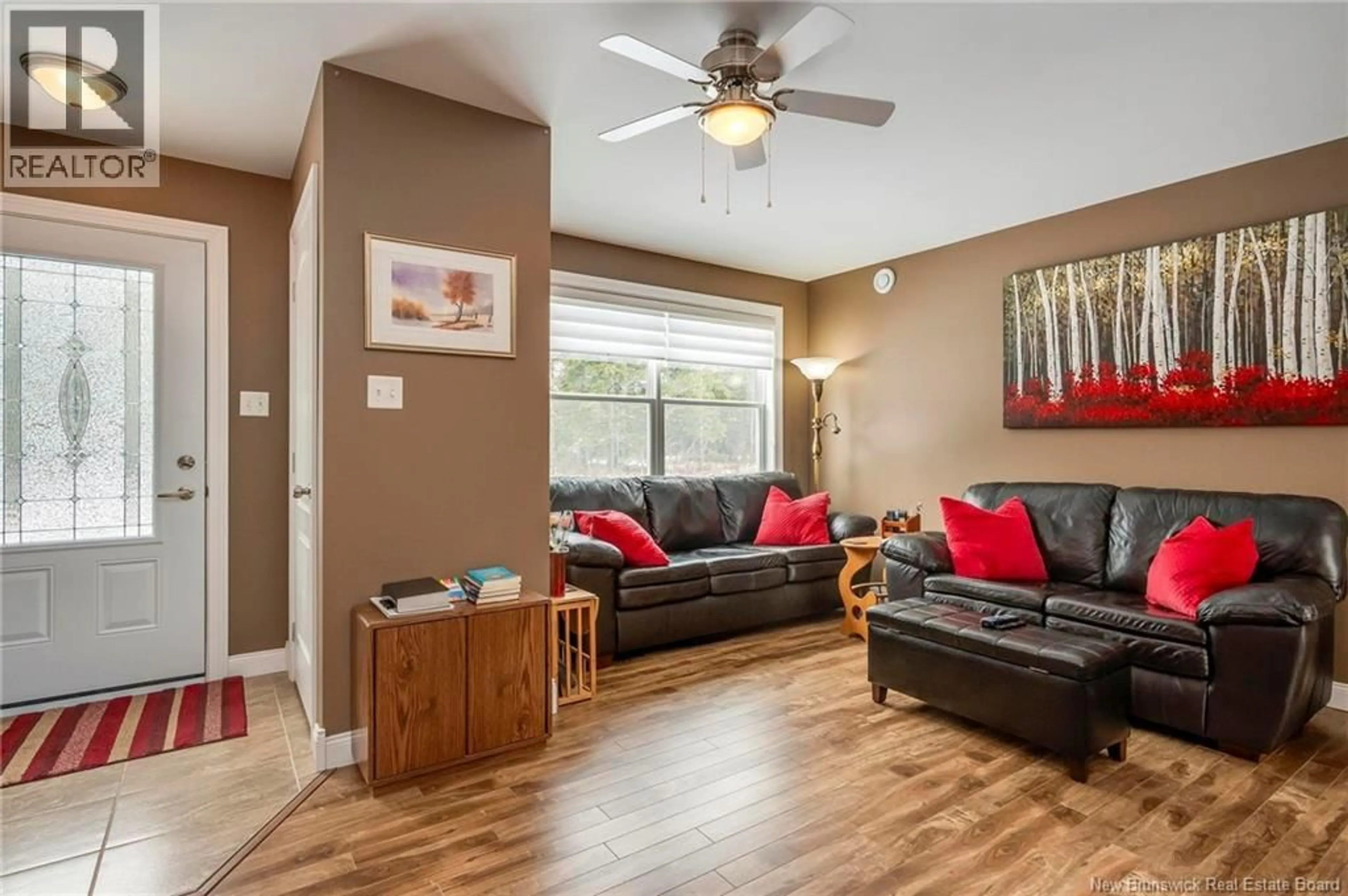 Living room with furniture, wood/laminate floor for 59 MCCARTHY'S POINT ROAD, Pocologan New Brunswick E5J0B7