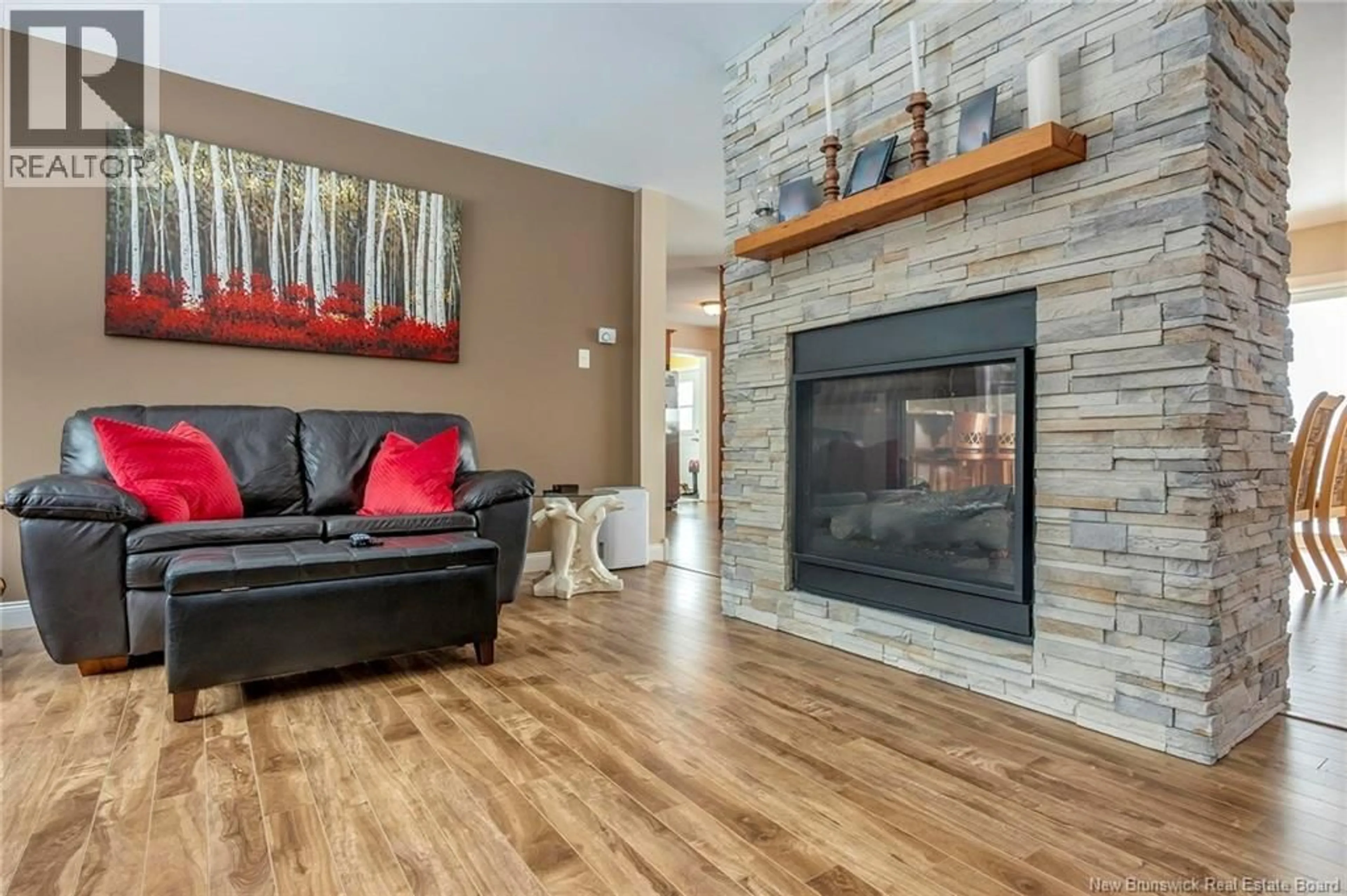Living room with furniture, wood/laminate floor for 59 MCCARTHY'S POINT ROAD, Pocologan New Brunswick E5J0B7