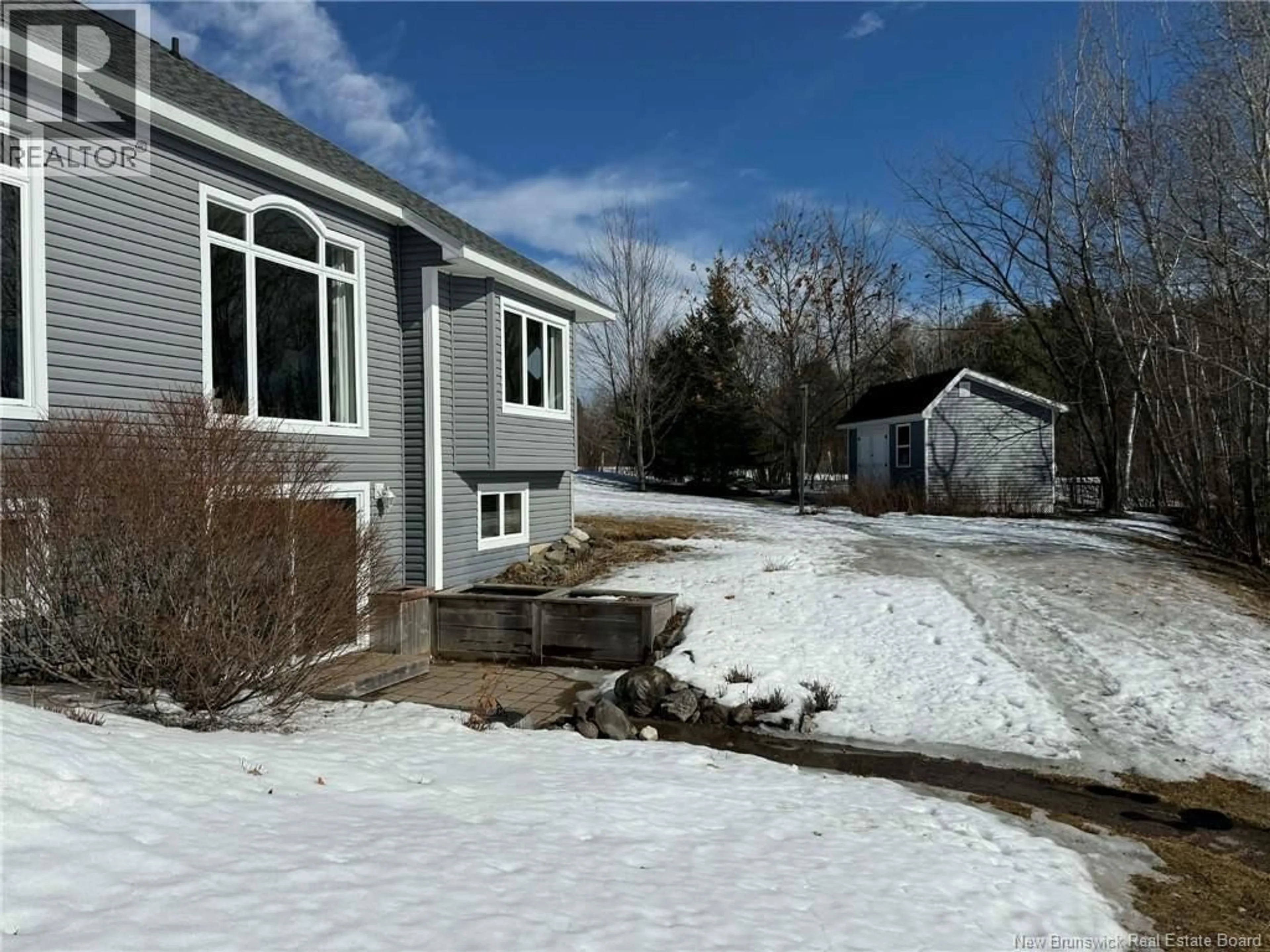 A pic from outside/outdoor area/front of a property/back of a property/a pic from drone, unknown for 15 MYLES LANE, Boom Road New Brunswick E9E2R9