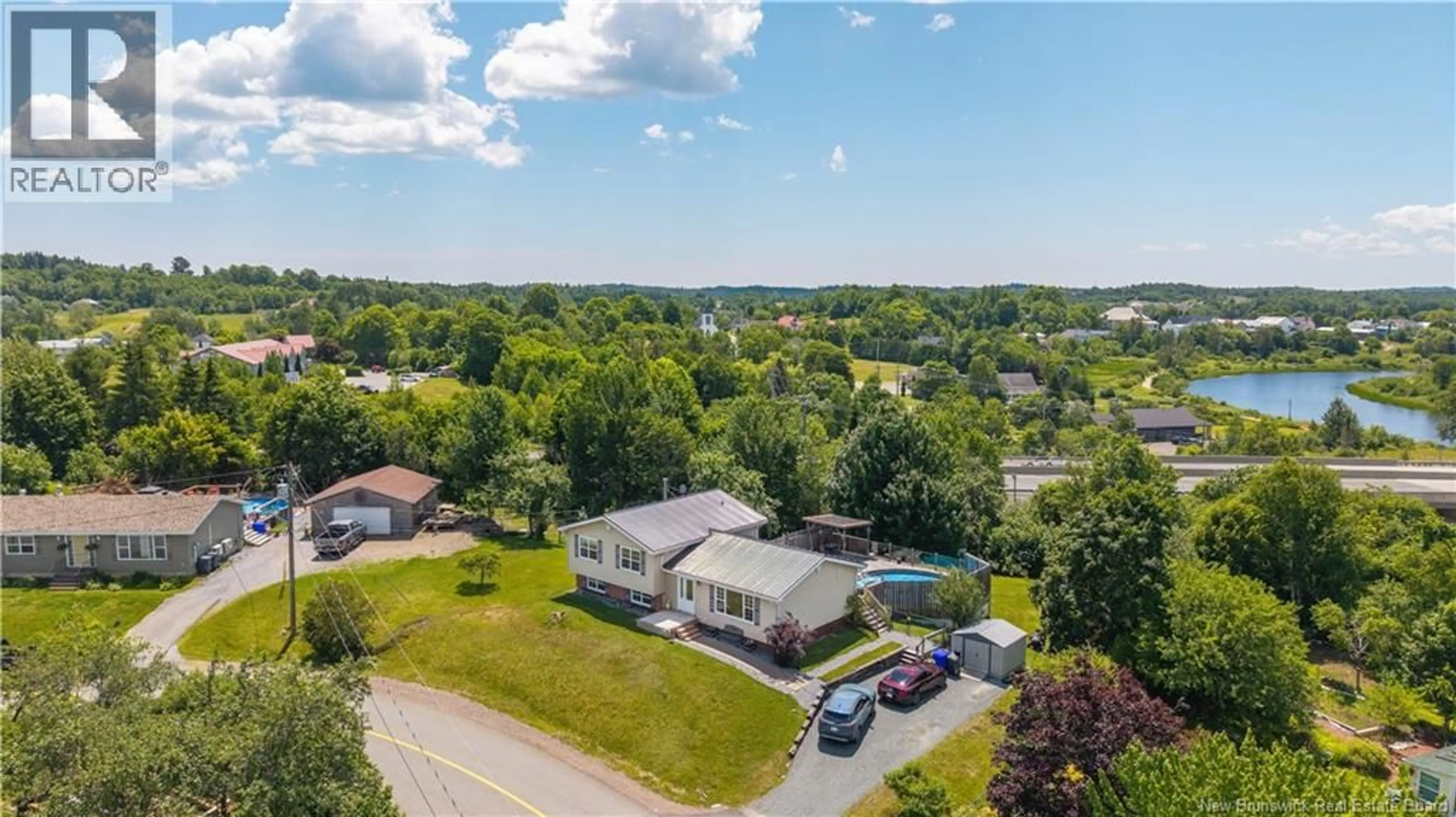 A pic from outside/outdoor area/front of a property/back of a property/a pic from drone, water/lake/river/ocean view for 6 KENNEDY COURT, St George New Brunswick E5C3G4