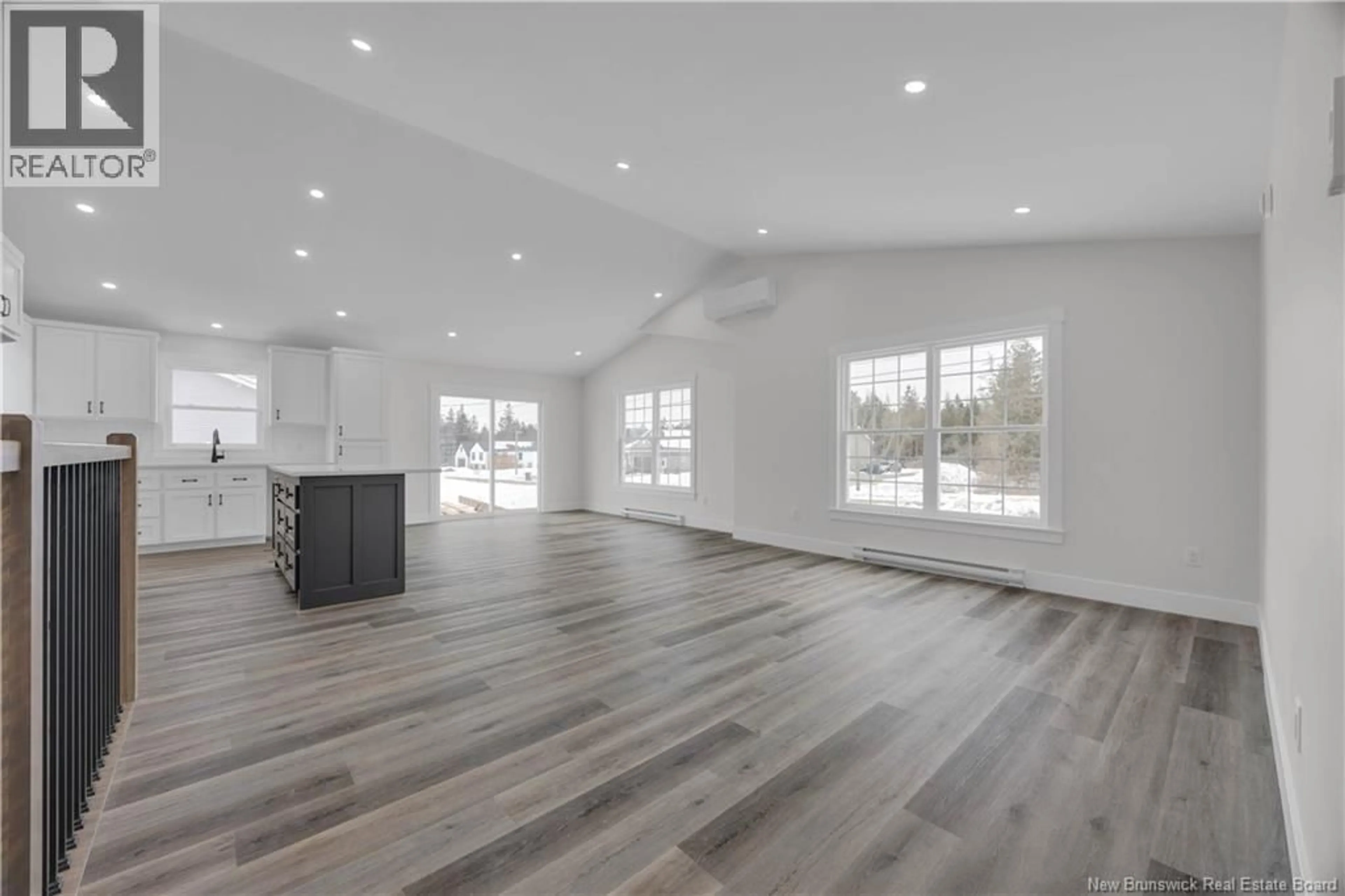 Open concept kitchen, wood/laminate floor for 17 CHRISTOPHER AVENUE, Hampton New Brunswick E5N0R3