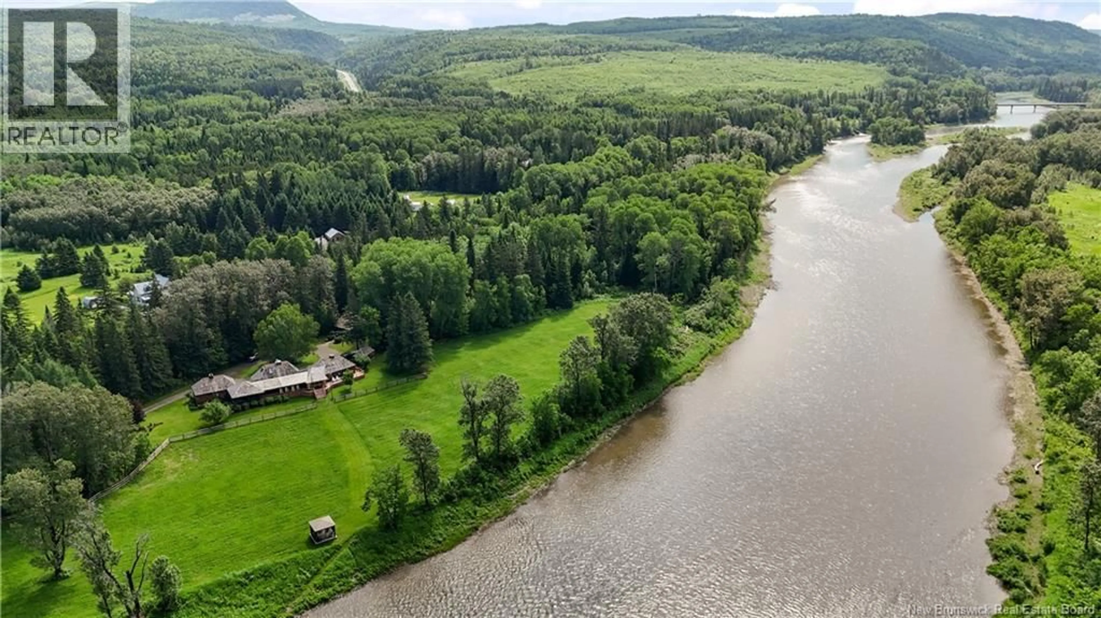 A pic from outside/outdoor area/front of a property/back of a property/a pic from drone, water/lake/river/ocean view for 115 MURRAY ROAD, Robinsonville New Brunswick E3N6H4