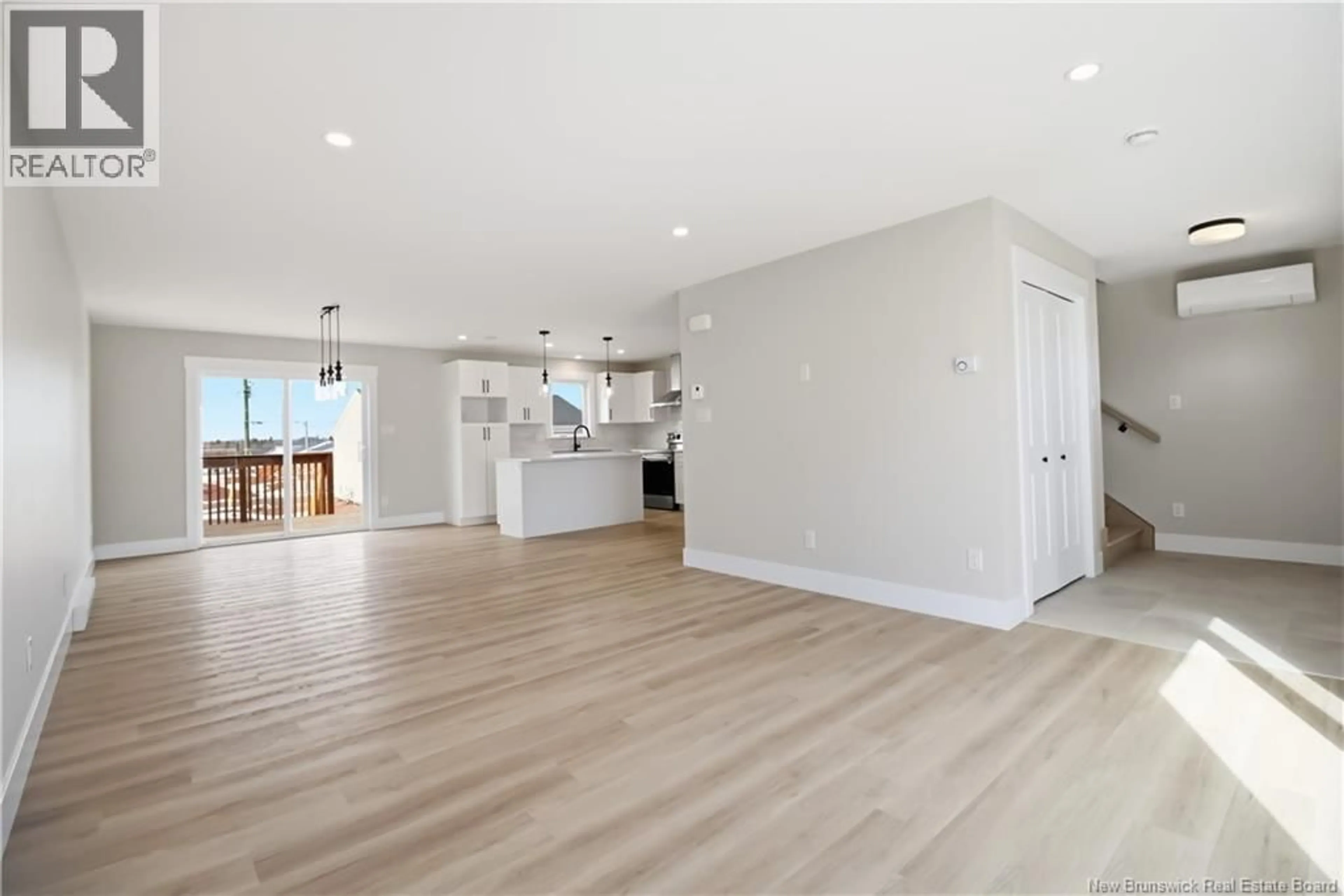 Open concept kitchen, wood/laminate floor for 213-215 MACCOUN STREET, Moncton New Brunswick E1K0A1