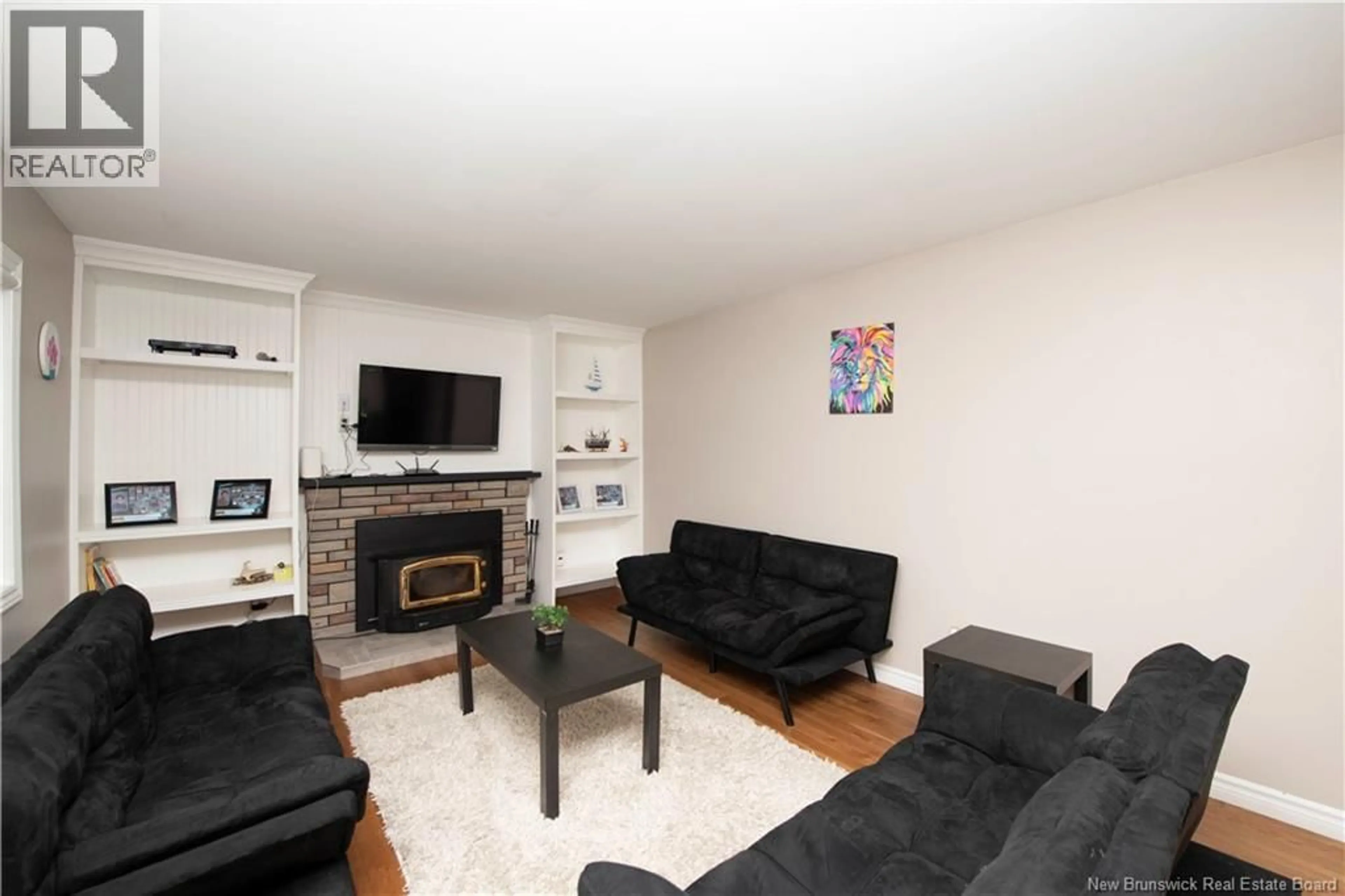 Living room with furniture, wood/laminate floor for 24 FRIER STREET, Moncton New Brunswick E1A4L8