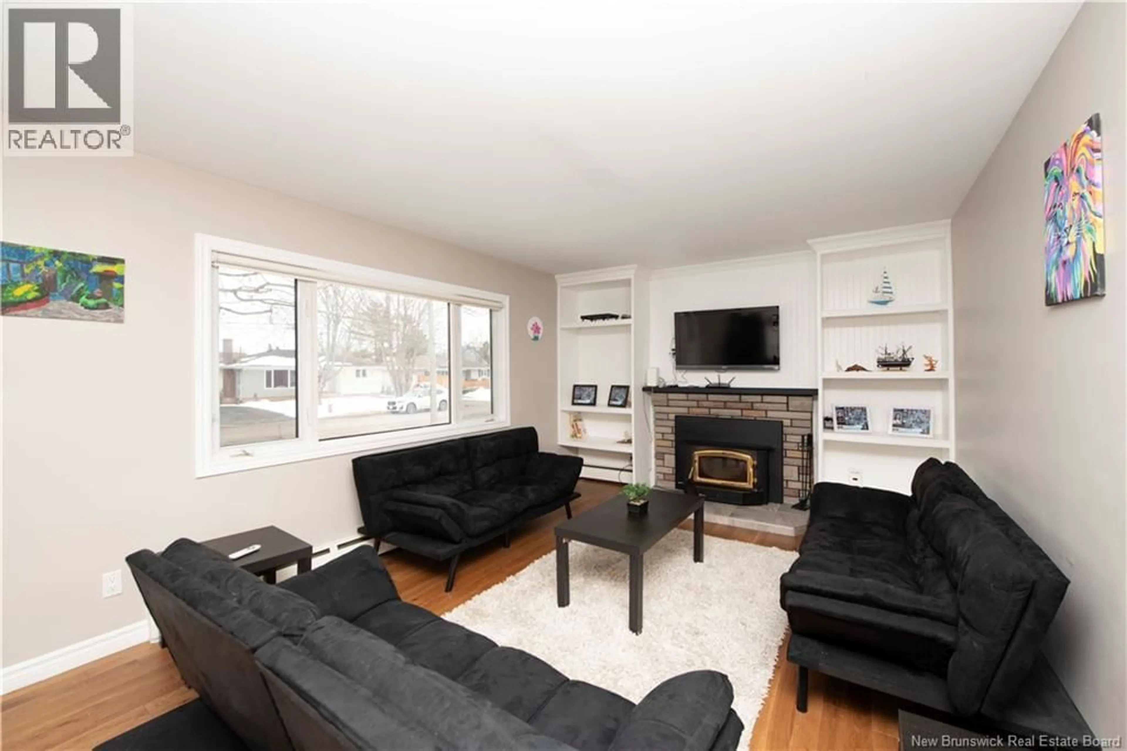 Living room with furniture, wood/laminate floor for 24 FRIER STREET, Moncton New Brunswick E1A4L8