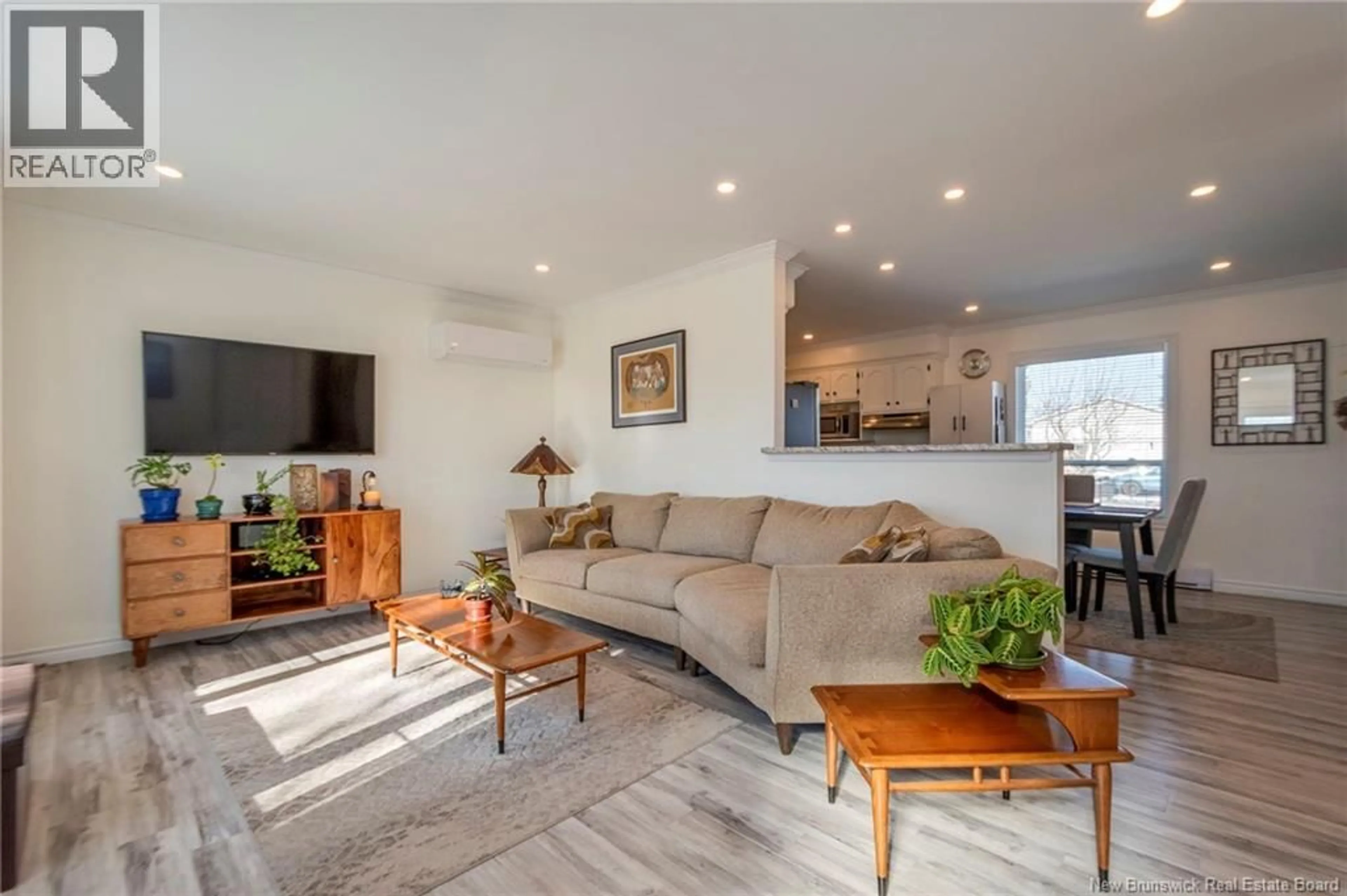 Living room with furniture, wood/laminate floor for 16 SUNNYBROOK TERRACE, Saint John New Brunswick E2J4L4
