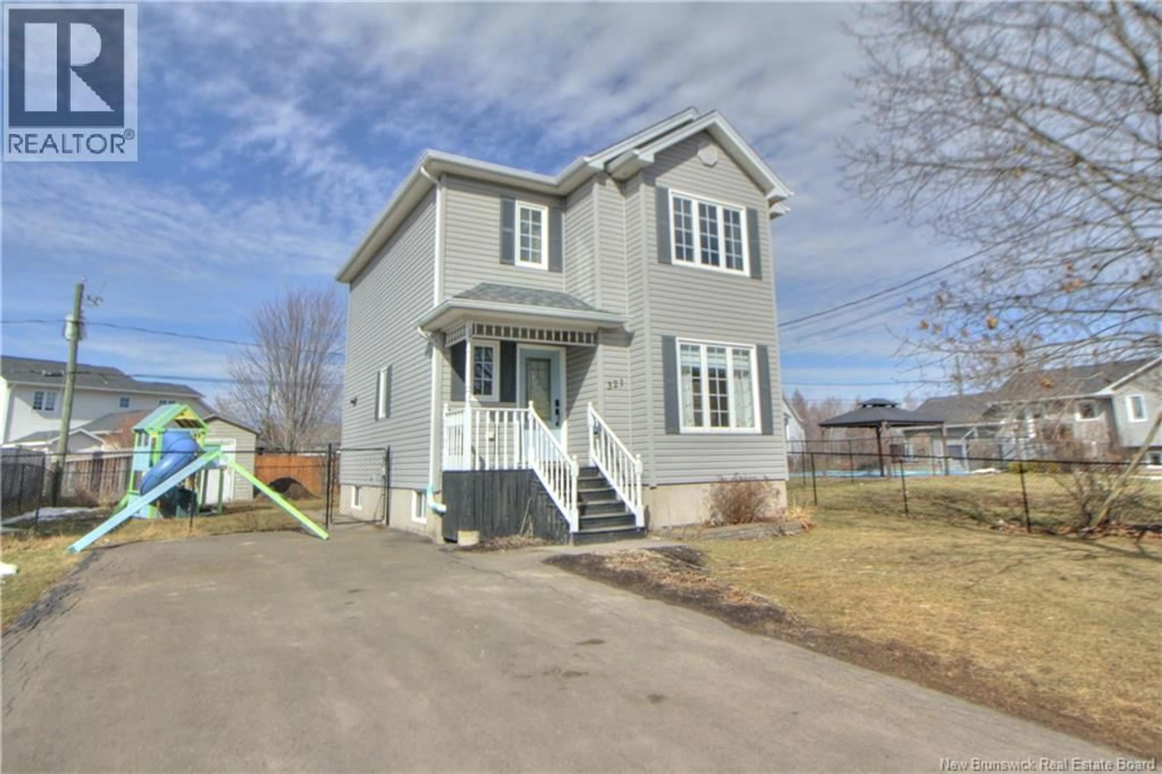 Home with vinyl exterior material, street for 321 RENNICK, Moncton New Brunswick E1G5G9