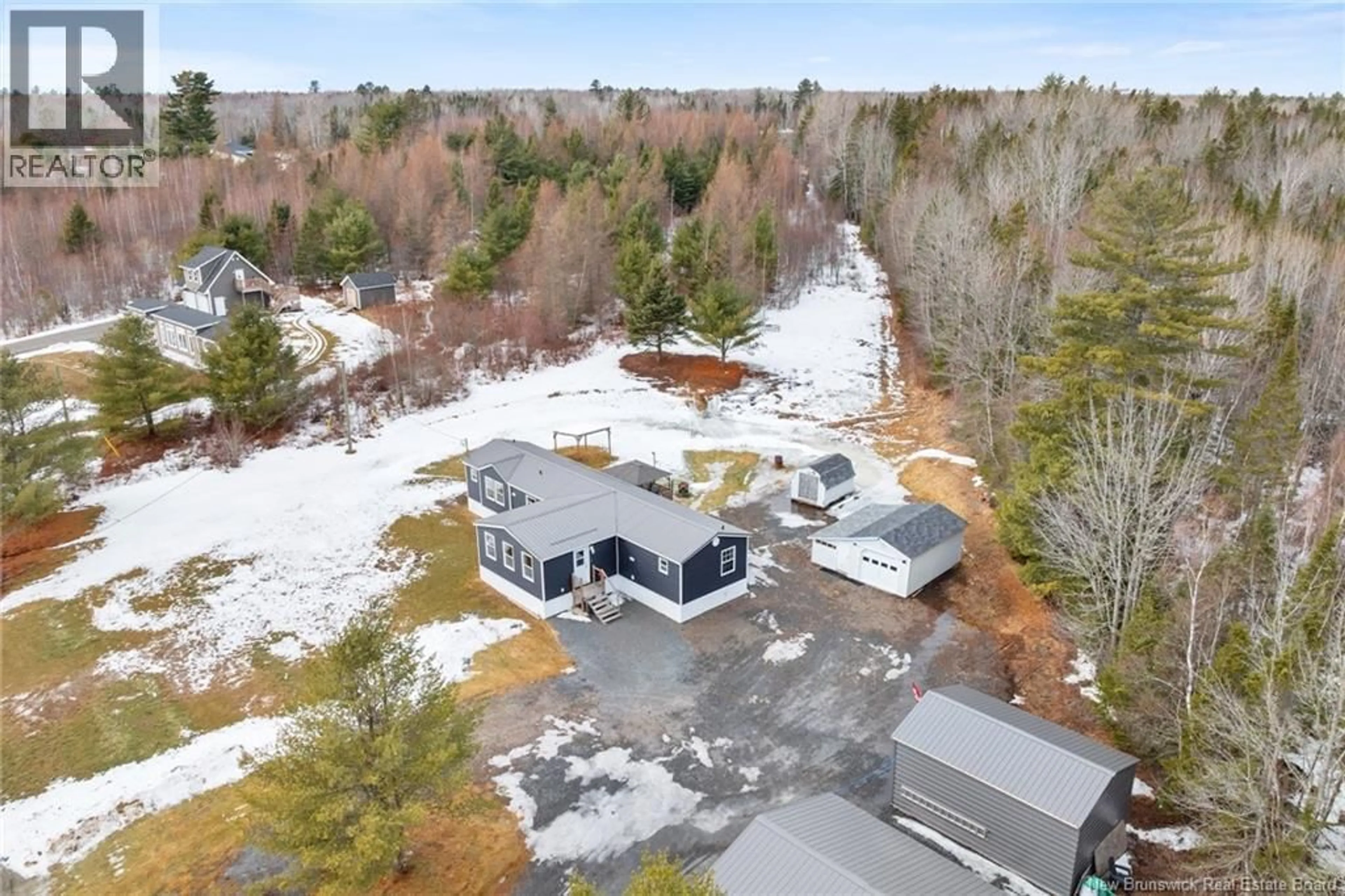 A pic from outside/outdoor area/front of a property/back of a property/a pic from drone, unknown for 1100 ROUTE 655, Waasis New Brunswick E3B8W2