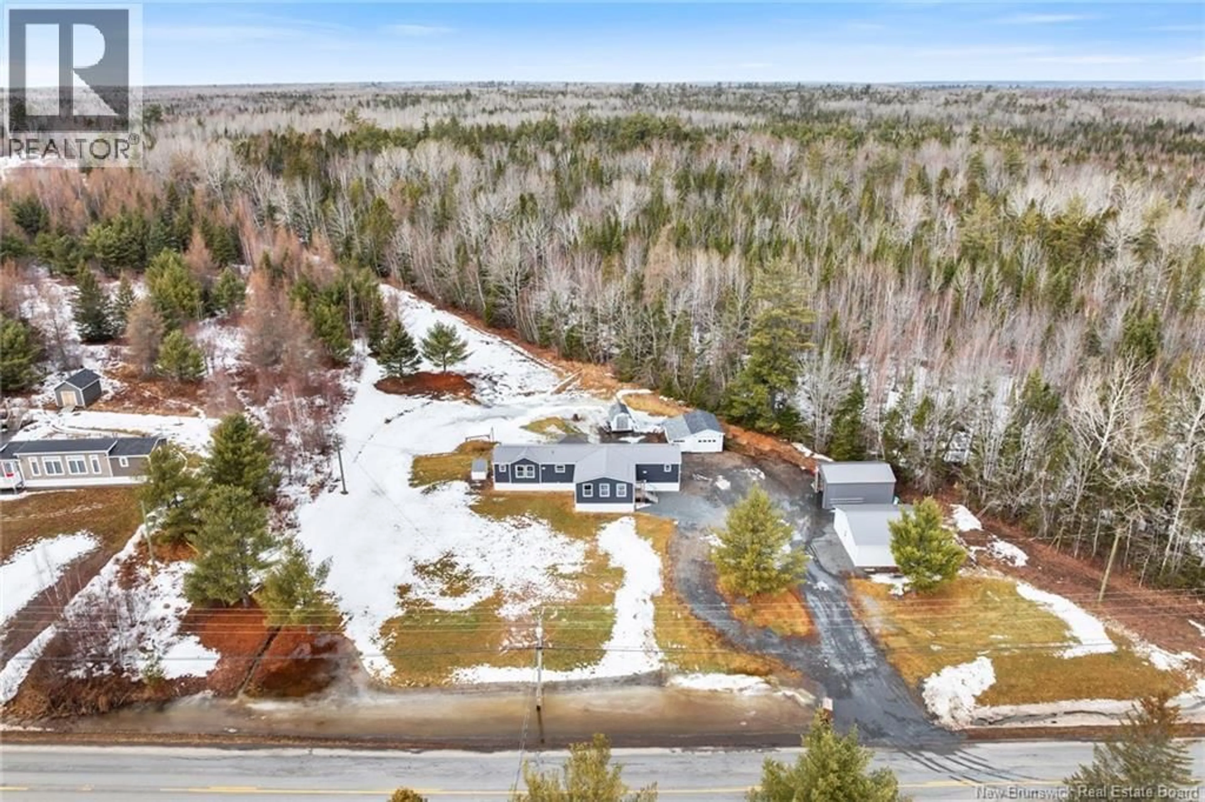 A pic from outside/outdoor area/front of a property/back of a property/a pic from drone, unknown for 1100 ROUTE 655, Waasis New Brunswick E3B8W2