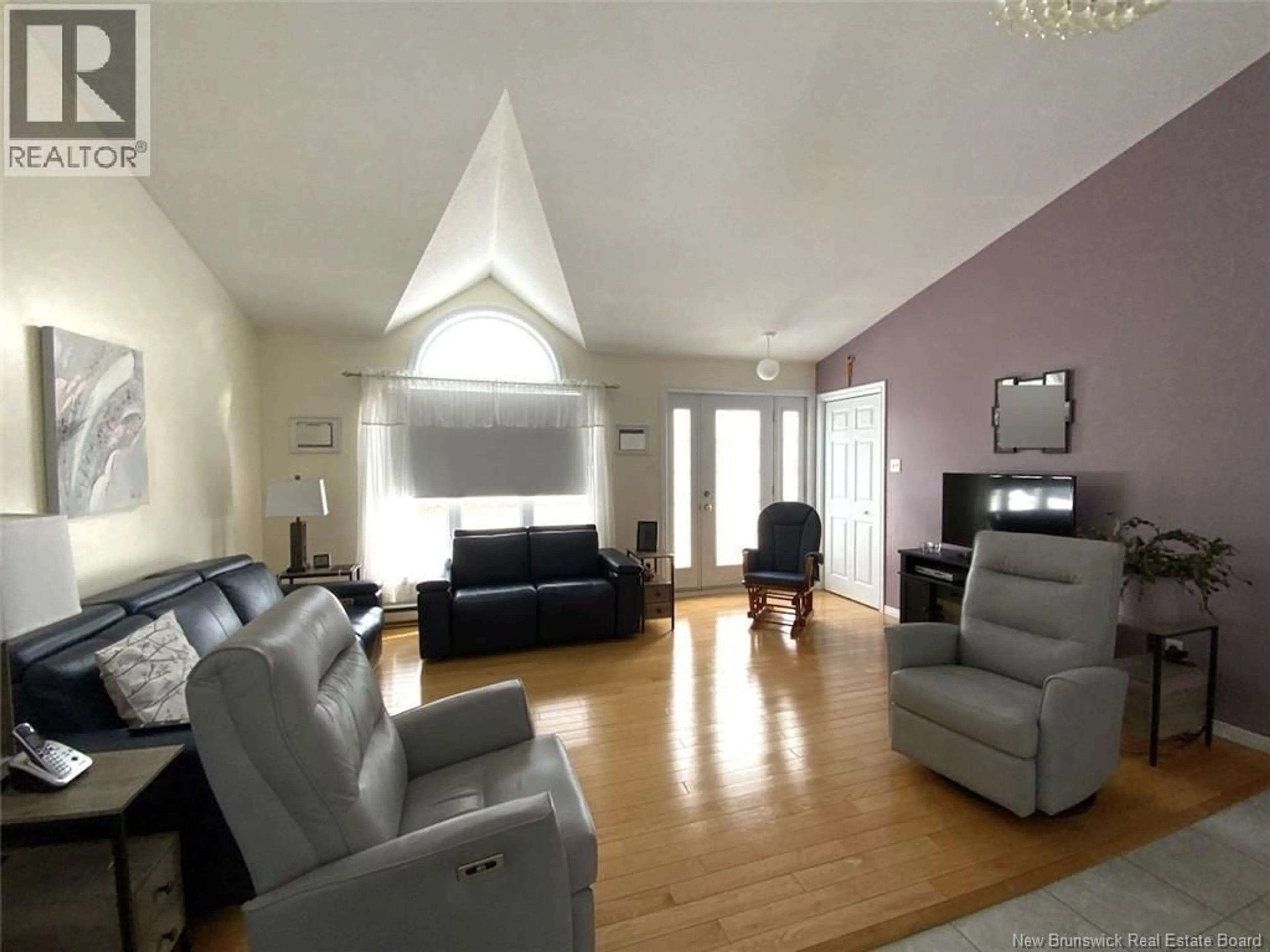 Living room with furniture, unknown for 32 MGR. DIONNE AVENUE, Edmundston New Brunswick E3V4Y7