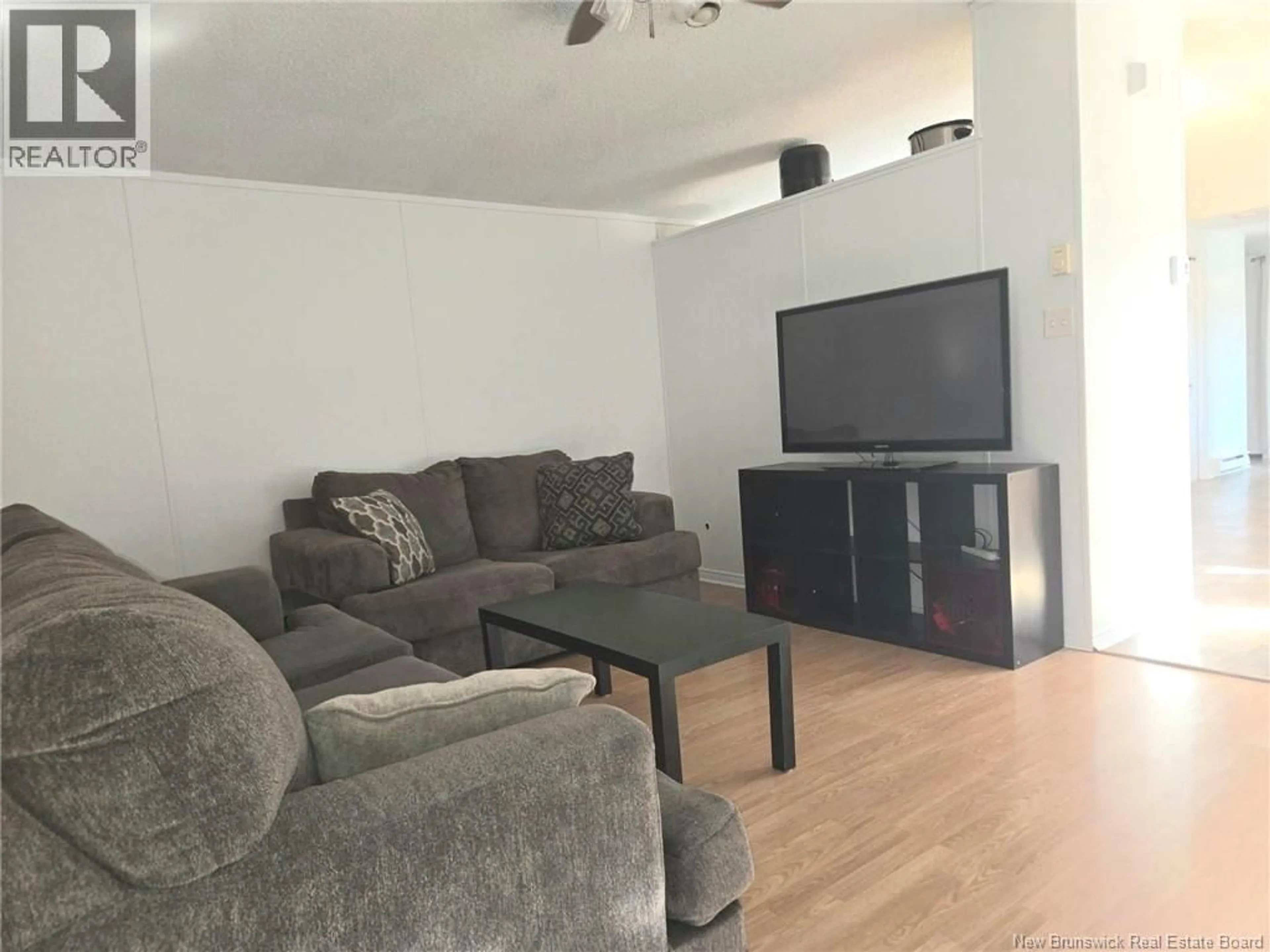 Living room with furniture, wood/laminate floor for 6963 ROUTE 126, Adamsville New Brunswick E4T2C5