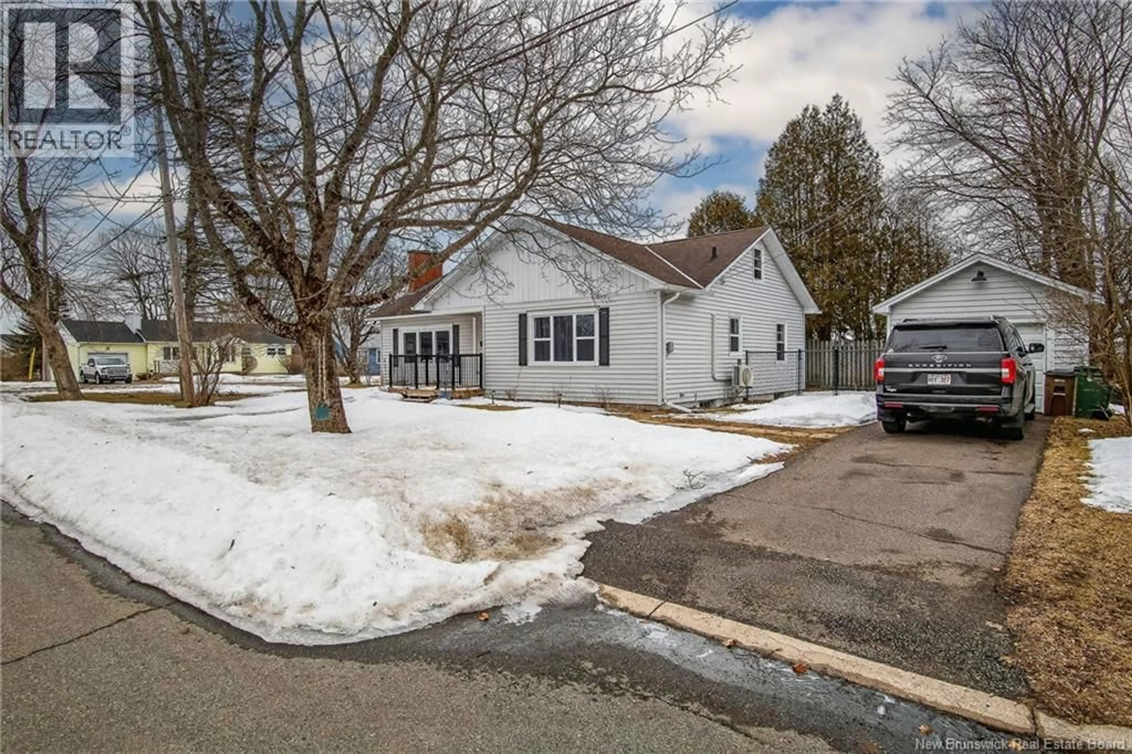 A pic from outside/outdoor area/front of a property/back of a property/a pic from drone, street for 15 FENTON DRIVE, Saint John New Brunswick E2M4E6