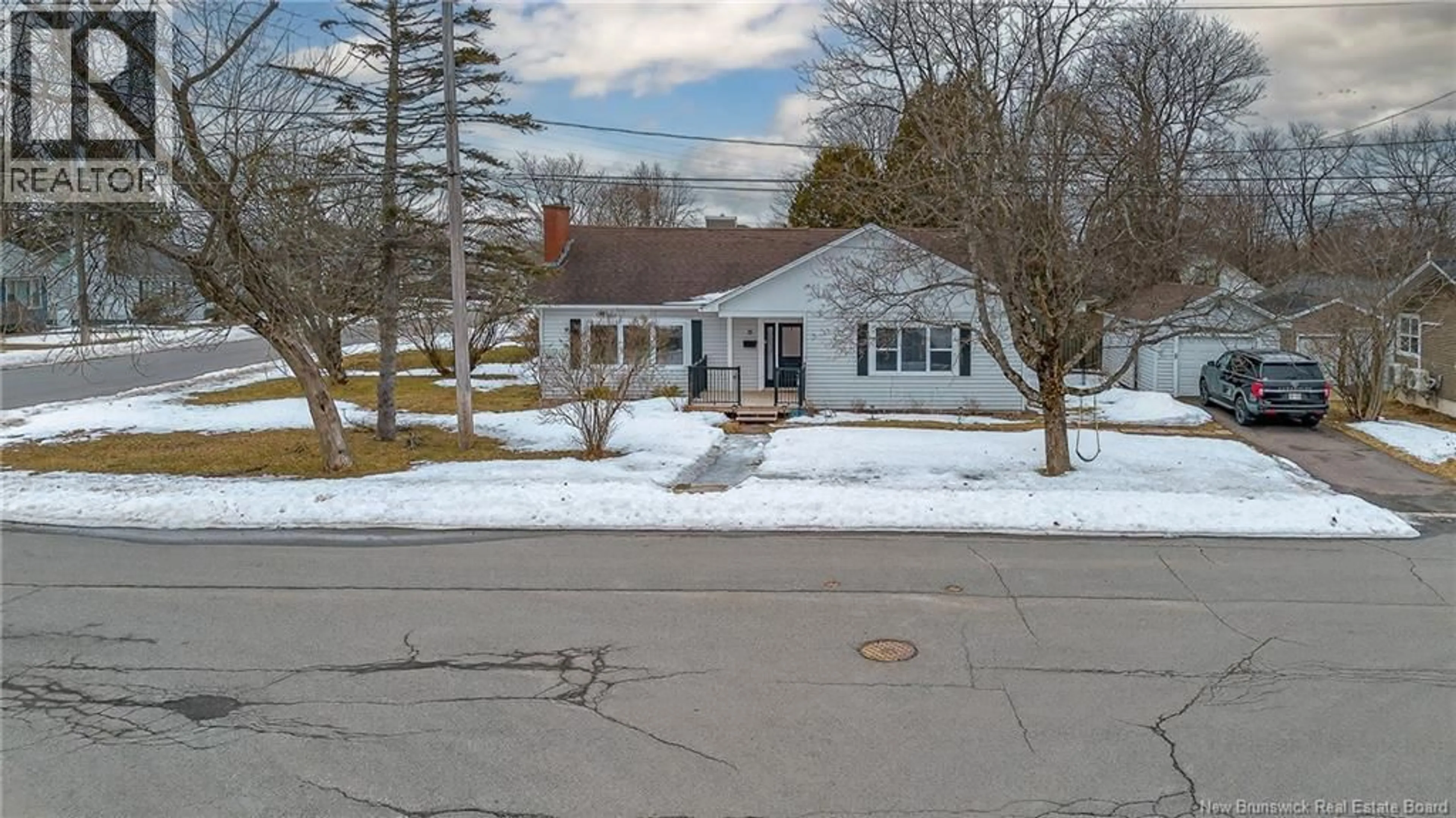 A pic from outside/outdoor area/front of a property/back of a property/a pic from drone, street for 15 FENTON DRIVE, Saint John New Brunswick E2M4E6