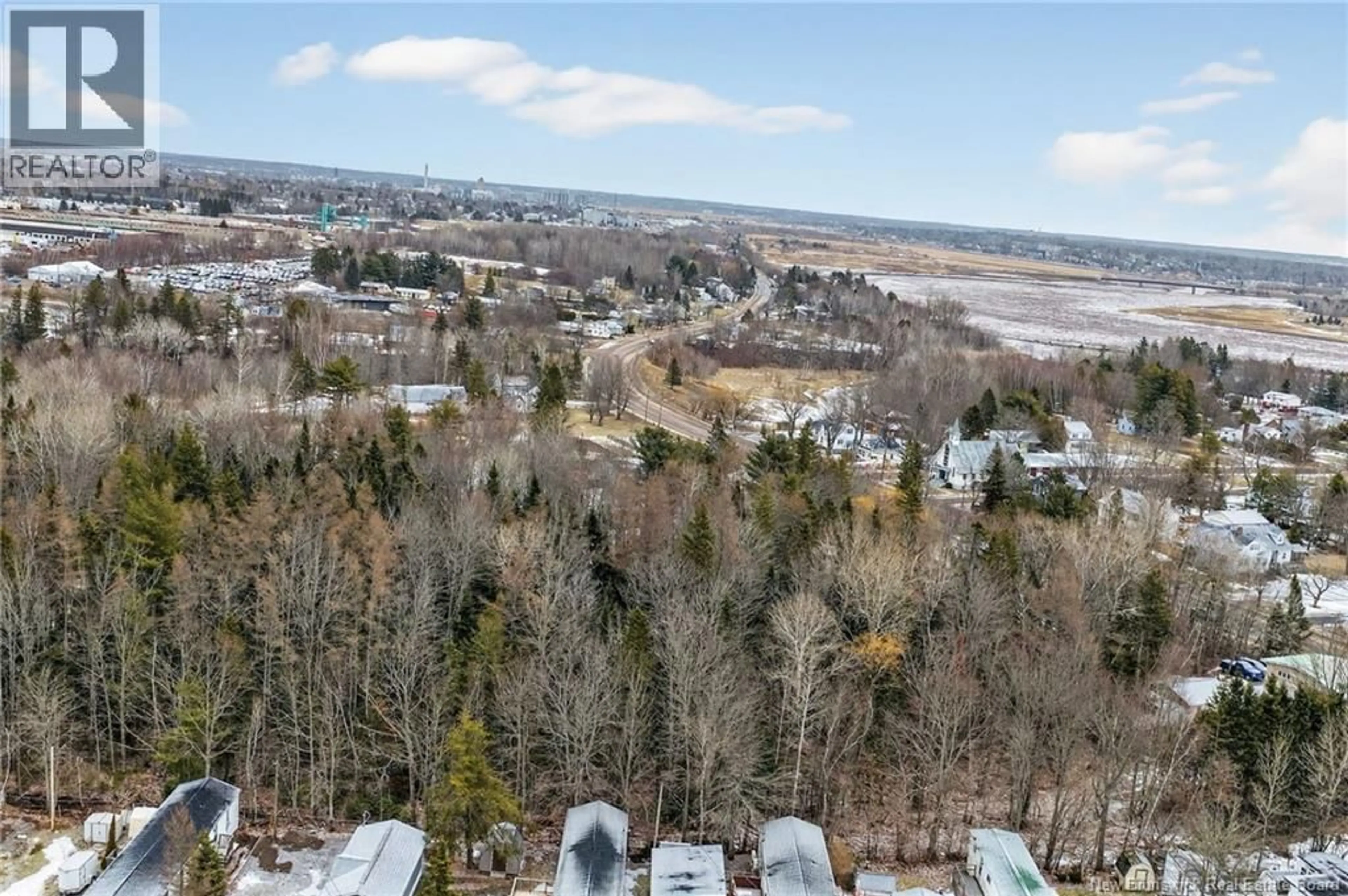 A pic from outside/outdoor area/front of a property/back of a property/a pic from drone, water/lake/river/ocean view for 21 CASCADE, Moncton New Brunswick E1E2J8