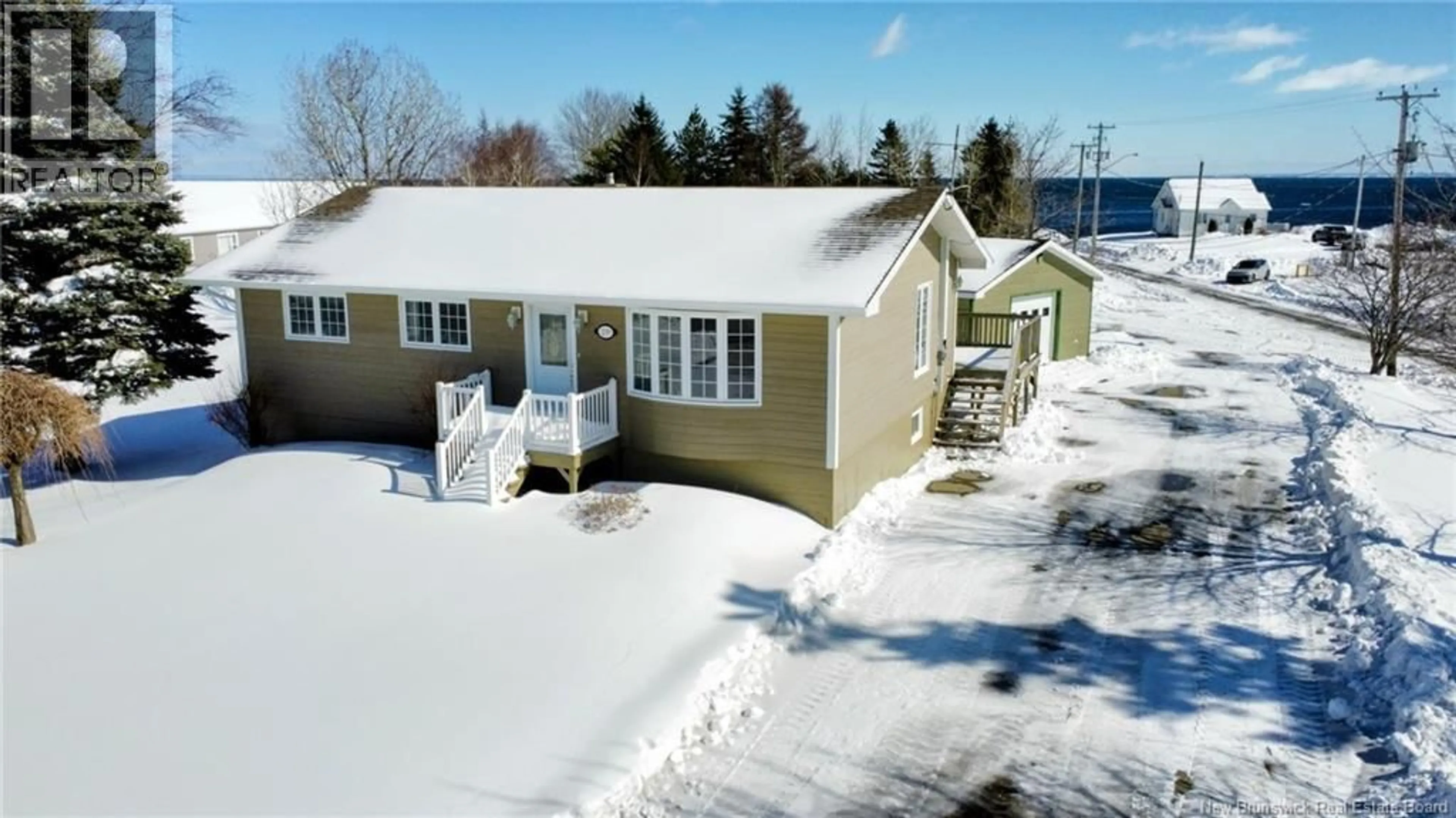 A pic from outside/outdoor area/front of a property/back of a property/a pic from drone, unknown for 239 PRINCIPALE, Nigadoo New Brunswick E8K3S8