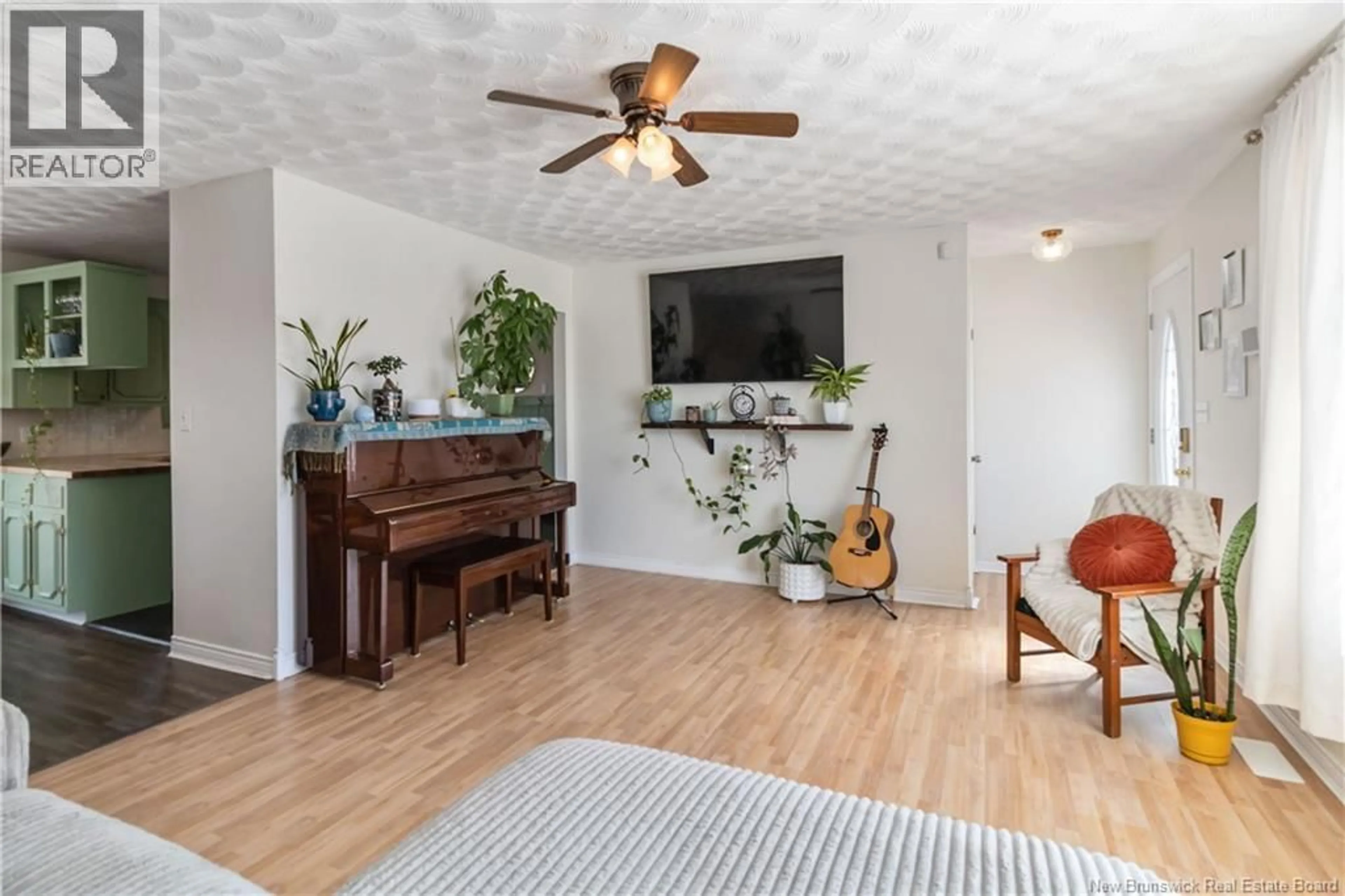 Living room with furniture, wood/laminate floor for 115 NOTINGHAM DRIVE, Moncton New Brunswick E1A5J9